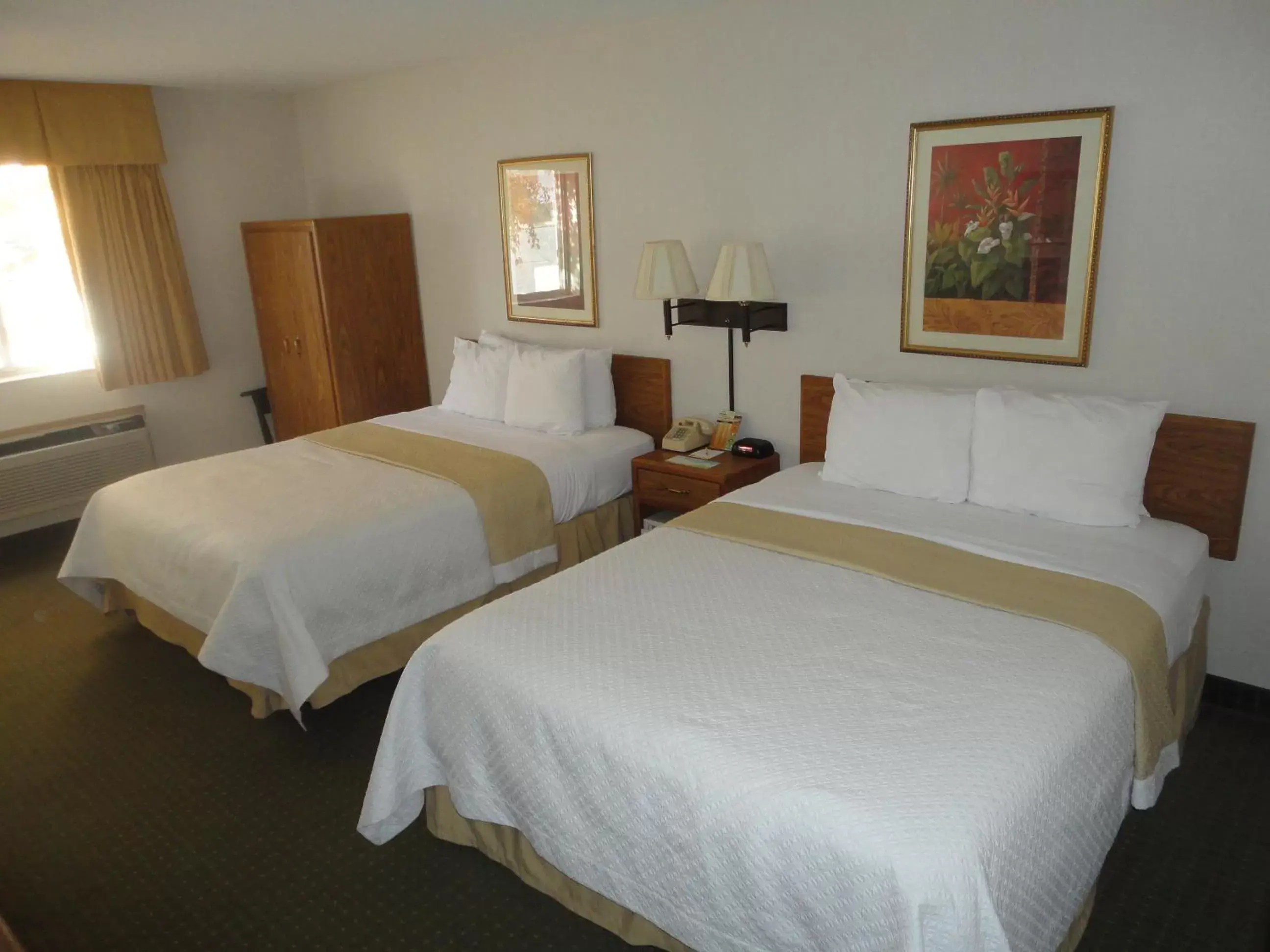 Bed in Days Inn by Wyndham Rapid City