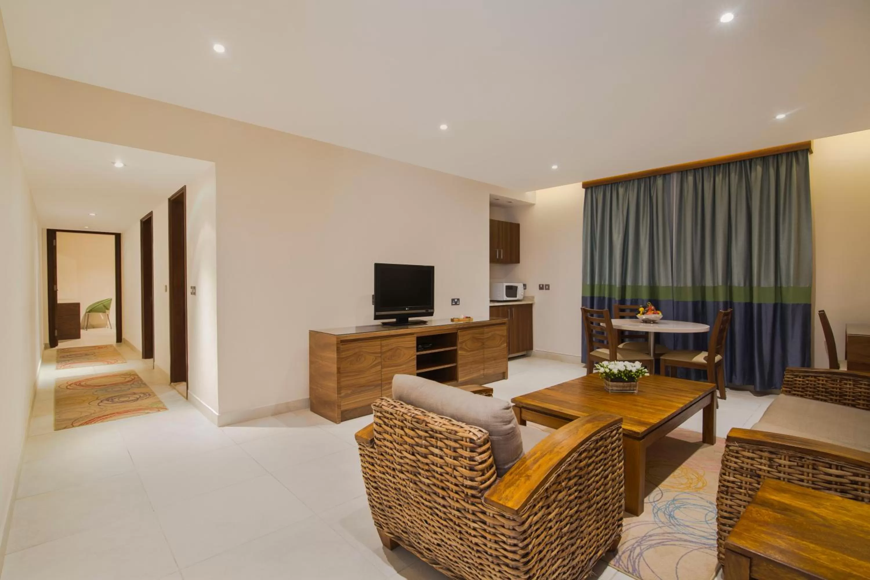 Living room, TV/Entertainment Center in The Palms Beach Hotel & Spa