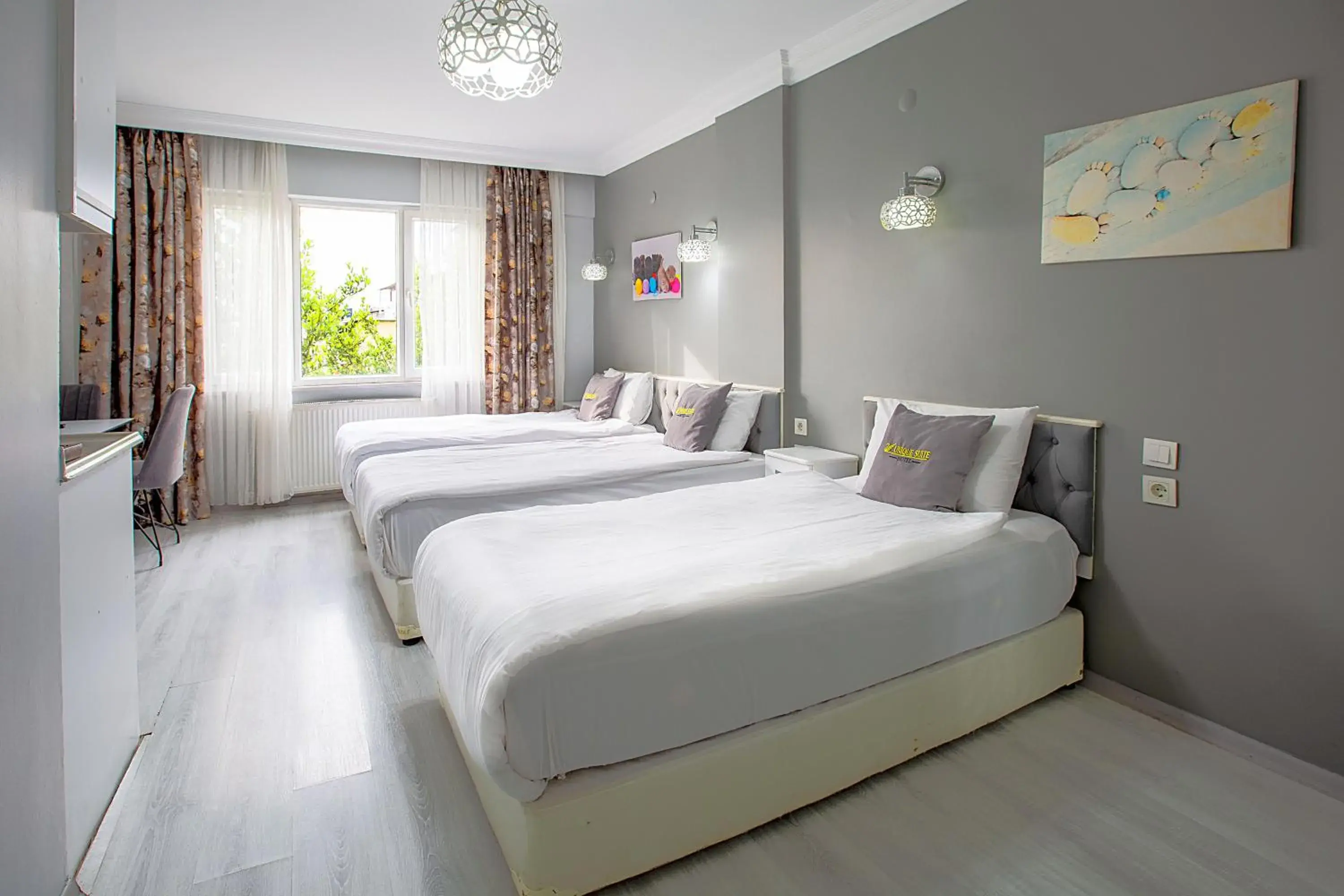 Bed in Unique Suite Hotel