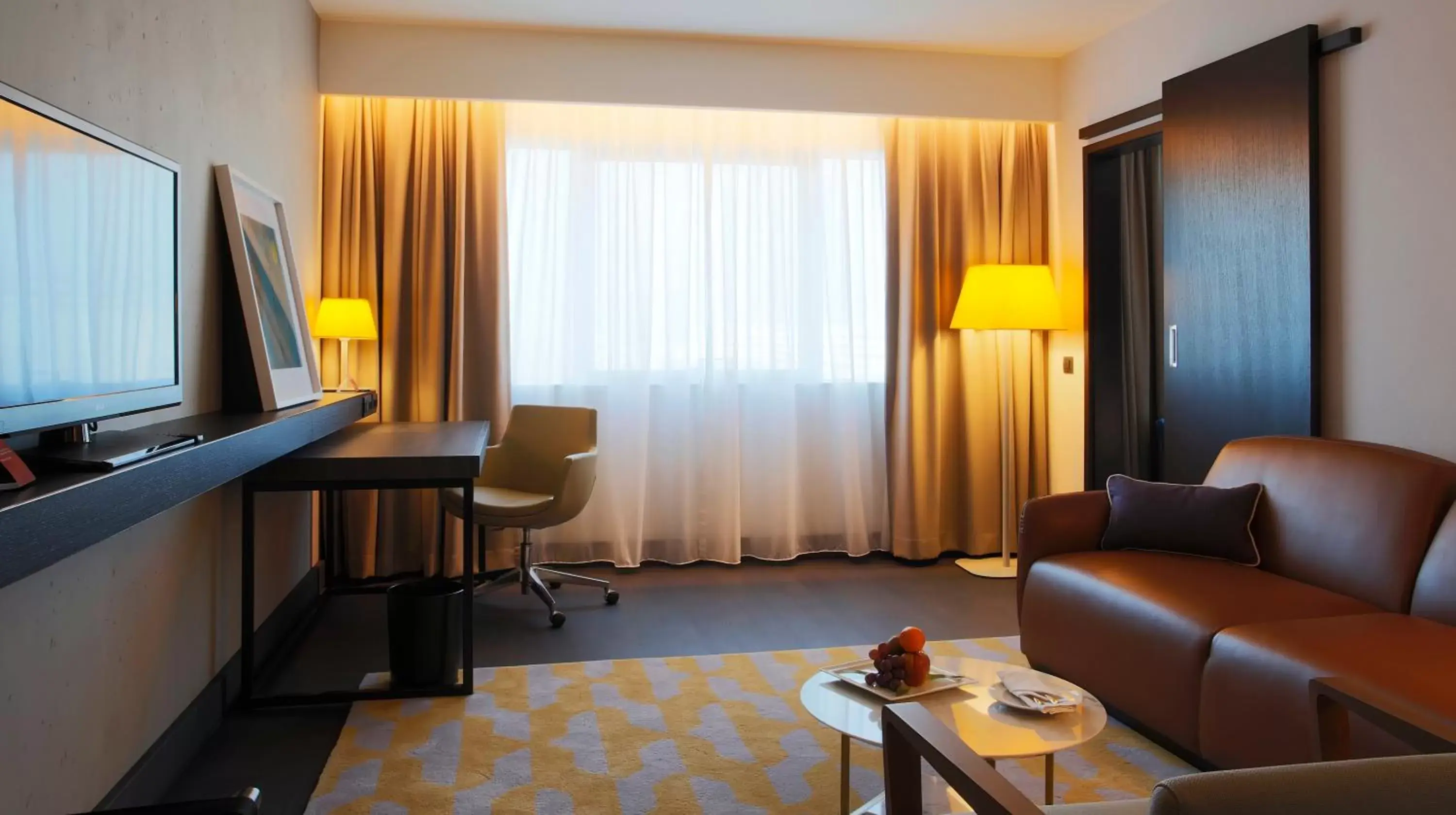 Living room, Seating Area in Crowne Plaza Belgrade, an IHG Hotel