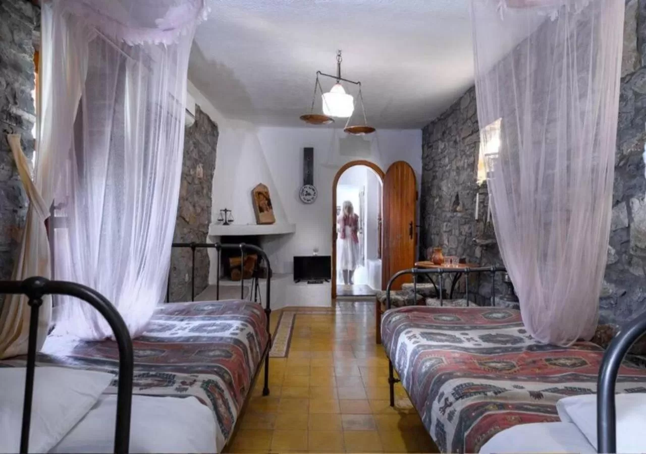 Bed, Seating Area in The Traditional Homes of Crete