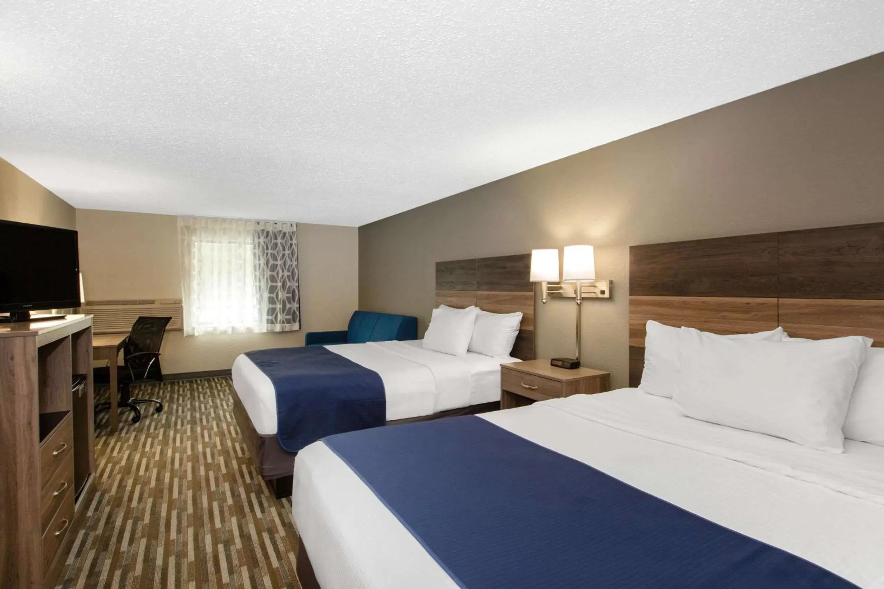 Photo of the whole room in Days Inn & Suites by Wyndham Wisconsin Dells