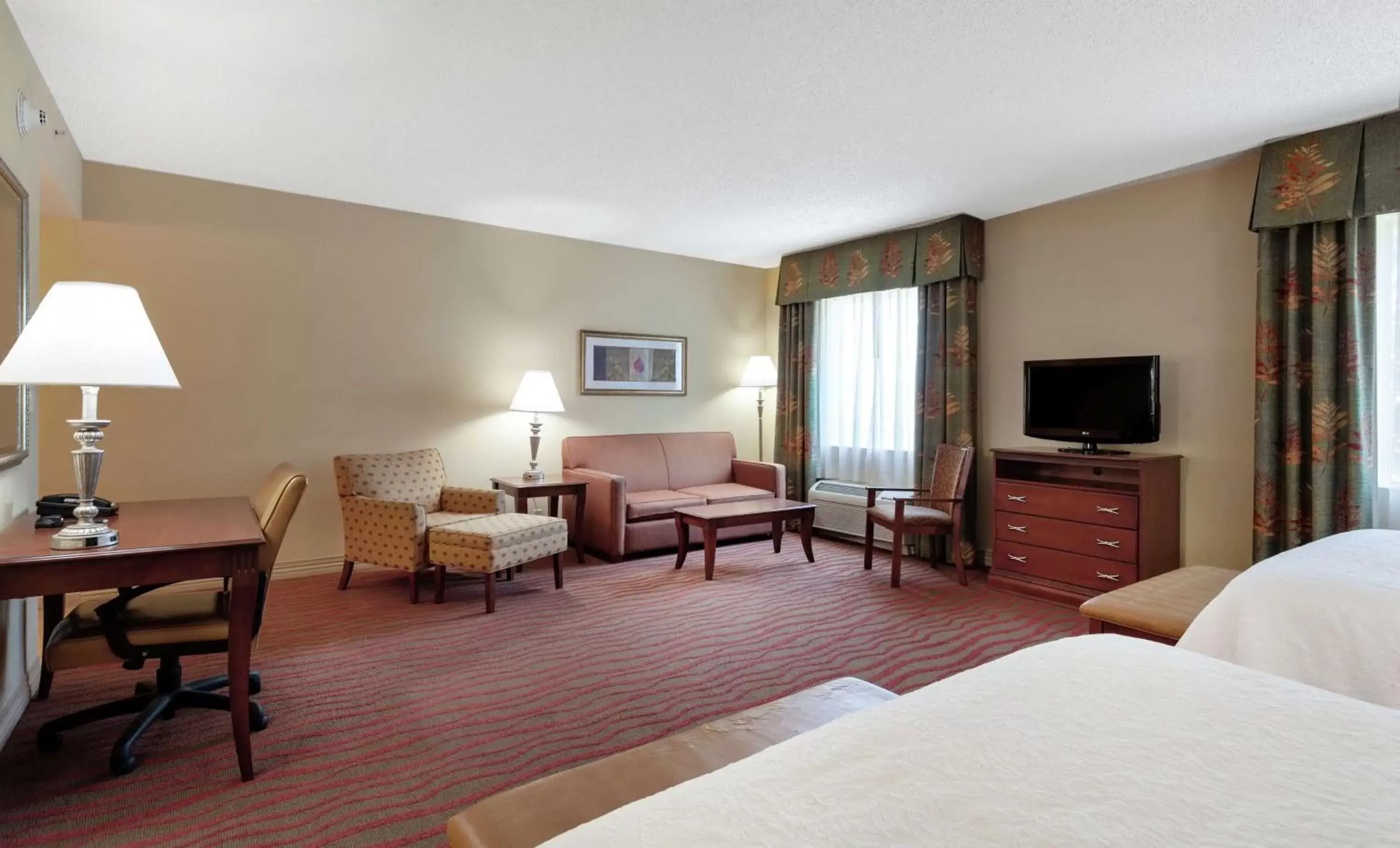 Bedroom, Seating Area in Hampton Inn & Suites Port Richey