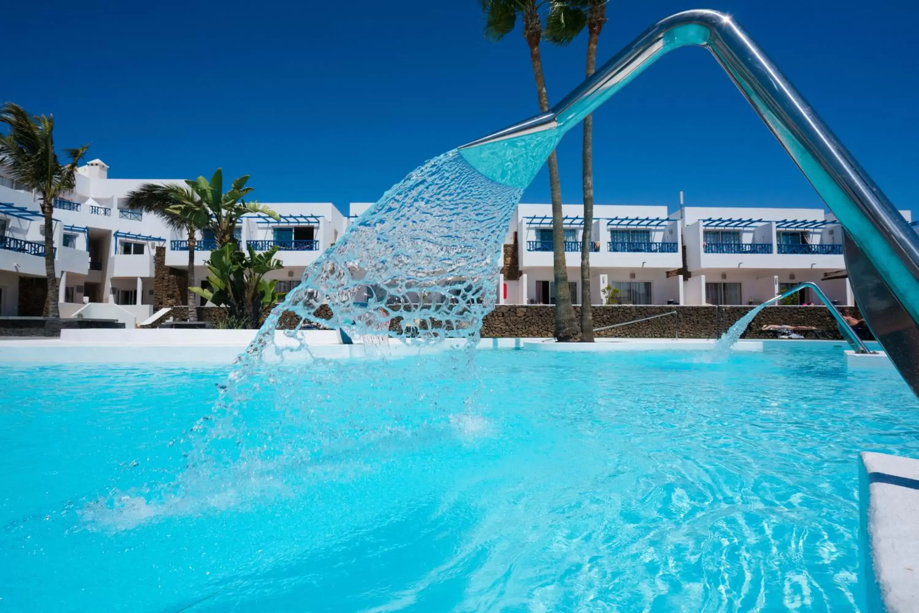 Swimming pool, Property Building in Hotel Club Siroco - Adults Only