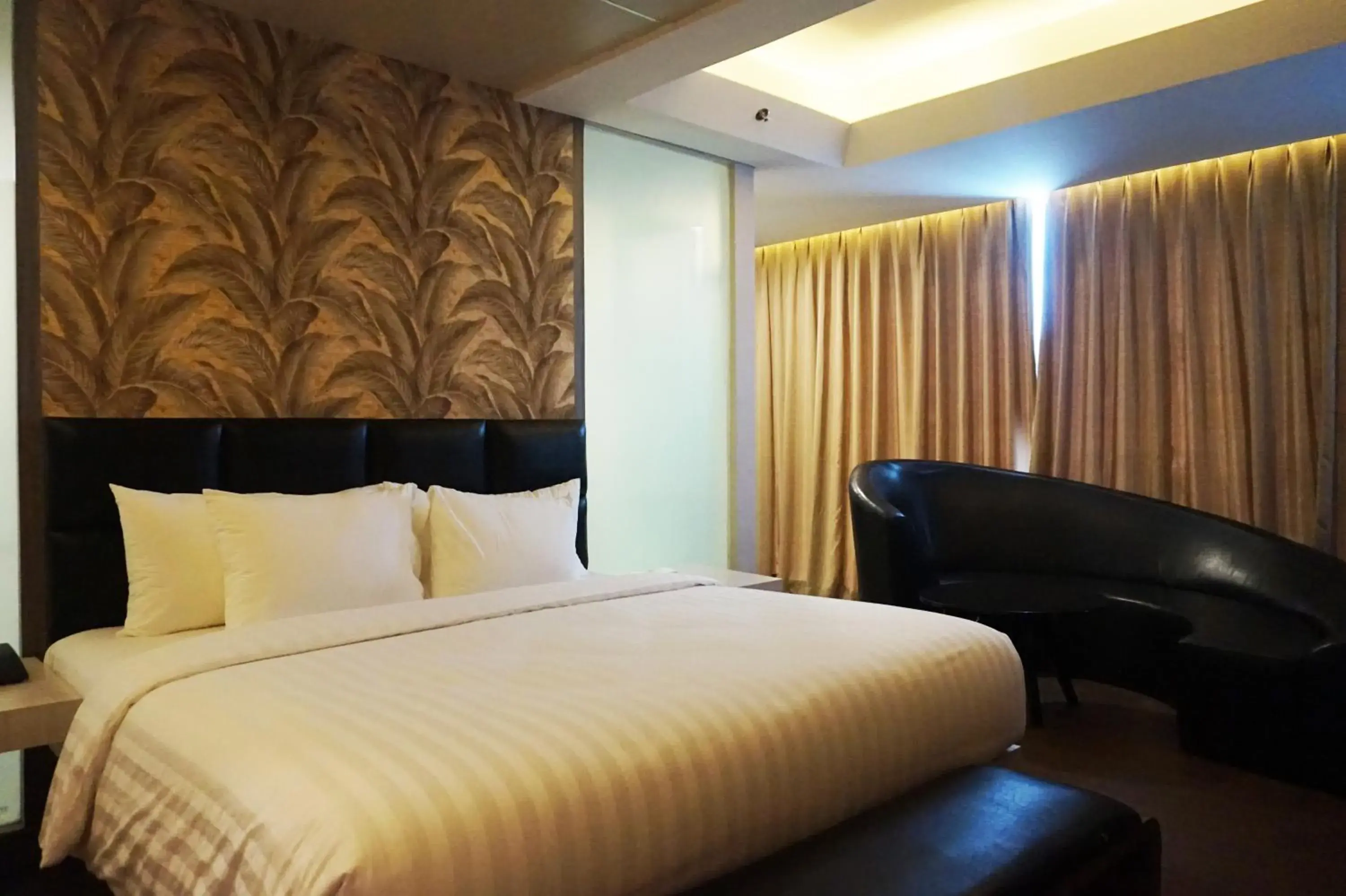 Bedroom, Bed in Luminor Hotel Jambi Kebun Jeruk By WH