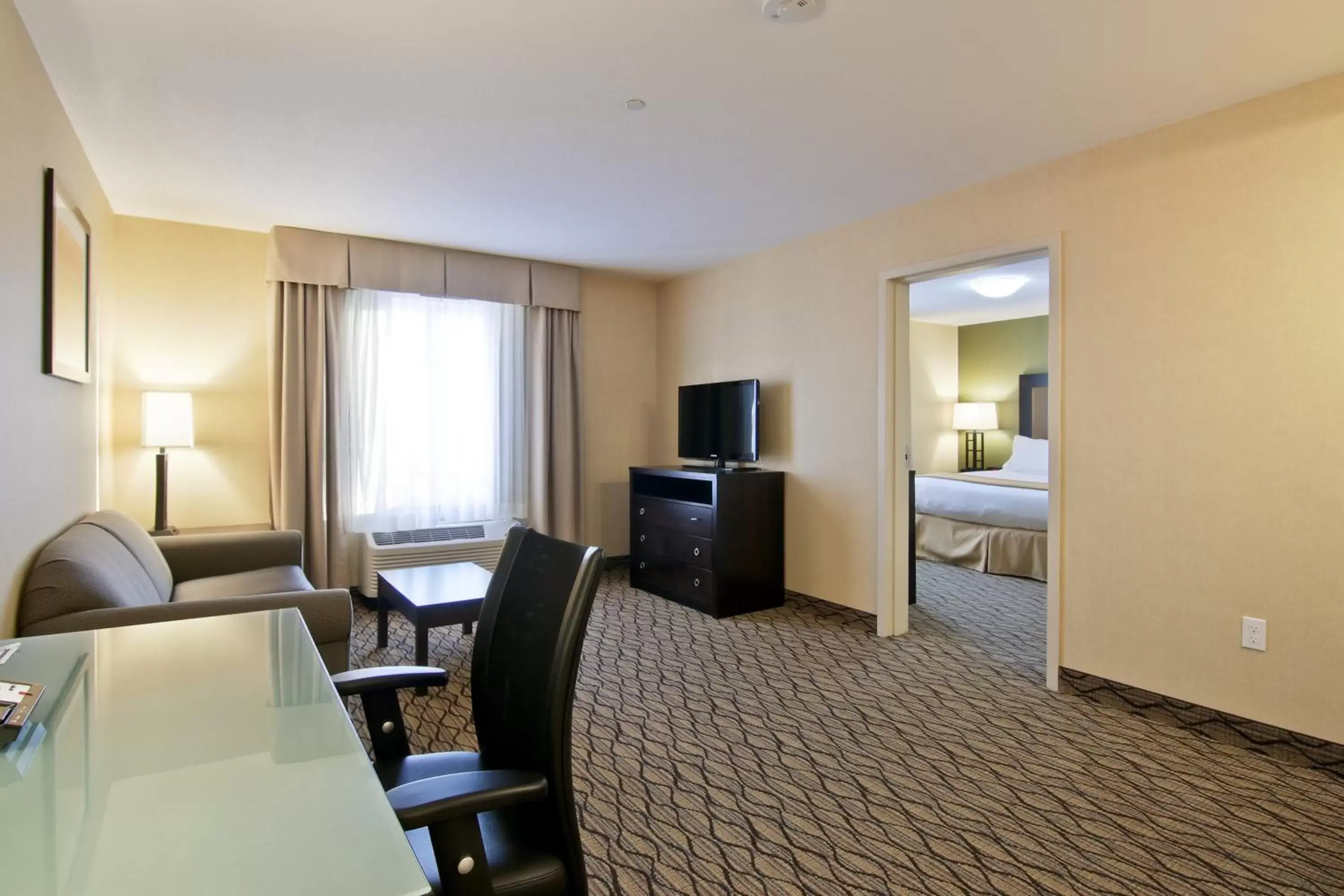 Photo of the whole room, TV/Entertainment Center in Holiday Inn Express Fort Saskatchewan, an IHG Hotel