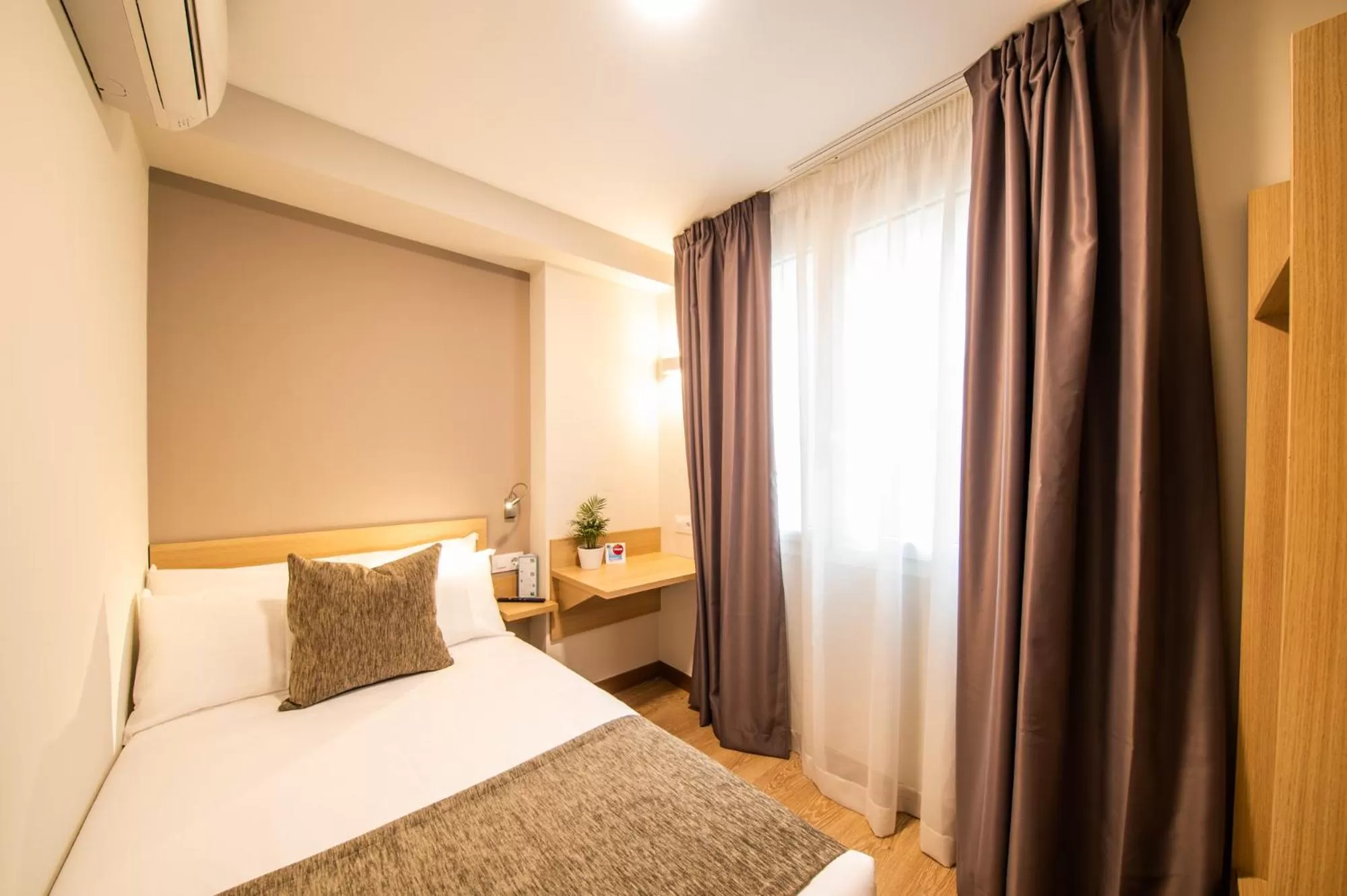 Bed in Hotel Vas Vitoria AutoCheckIn