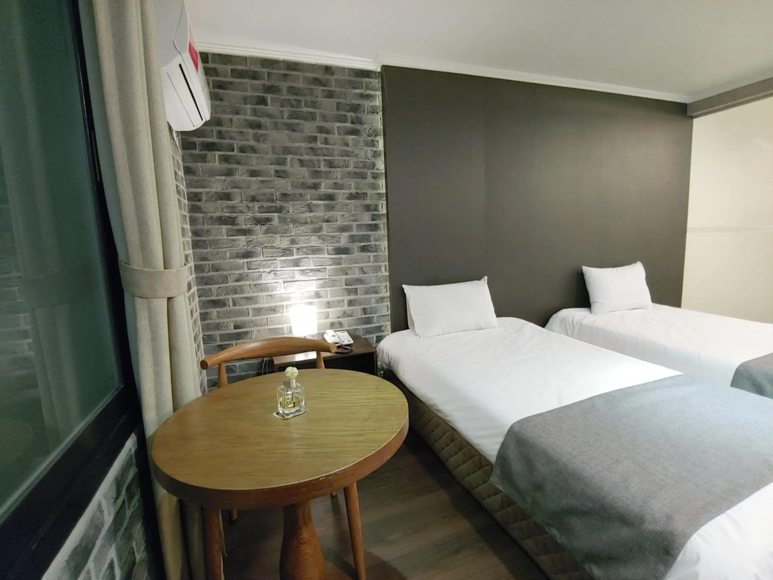 Bed in Hotel Tong Yeondong Jeju