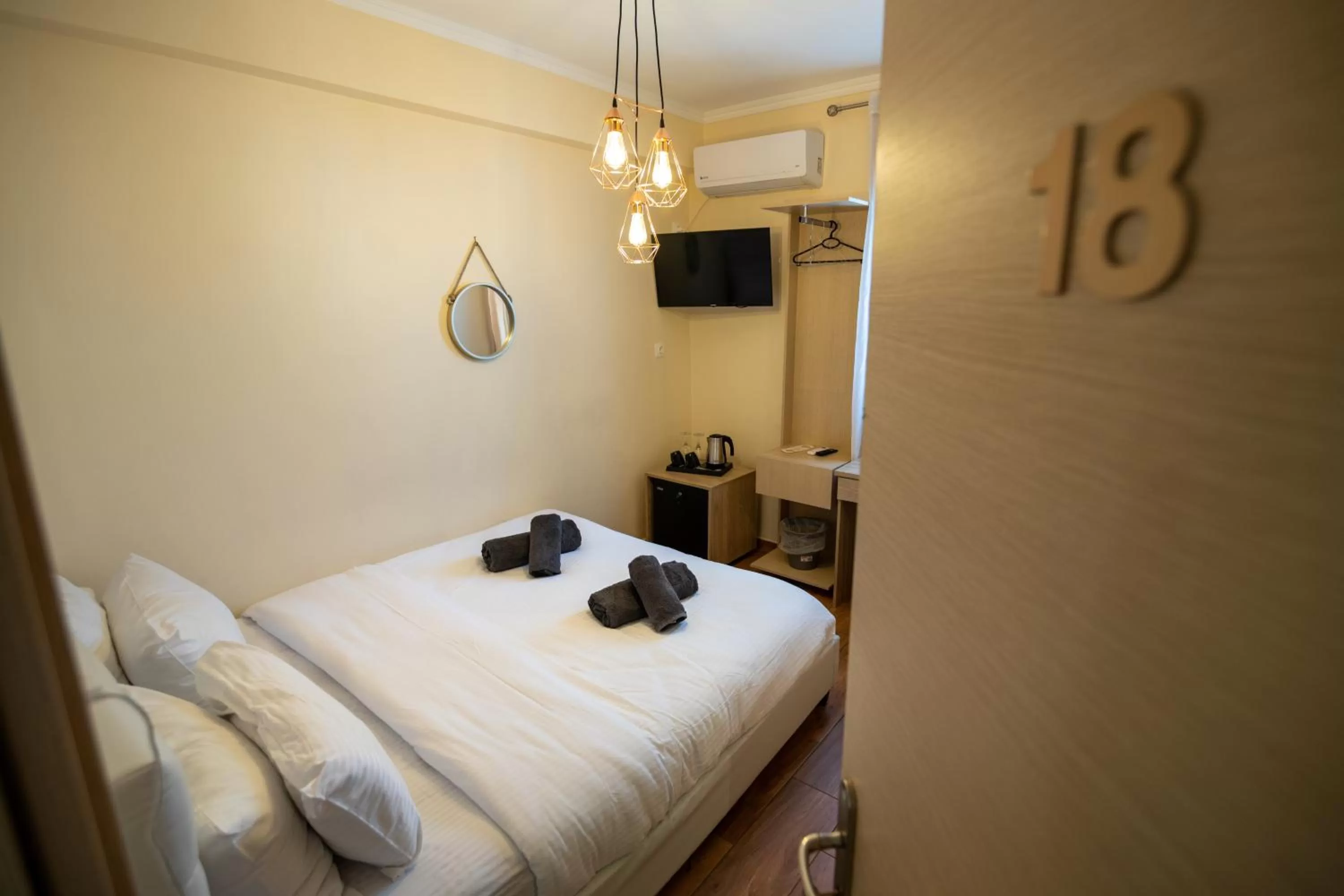 Bed in Votsalakia Hotel & Luxury Apartments