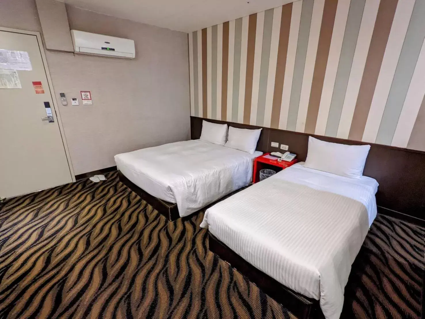 Bed in LIHO Hotel Tainan