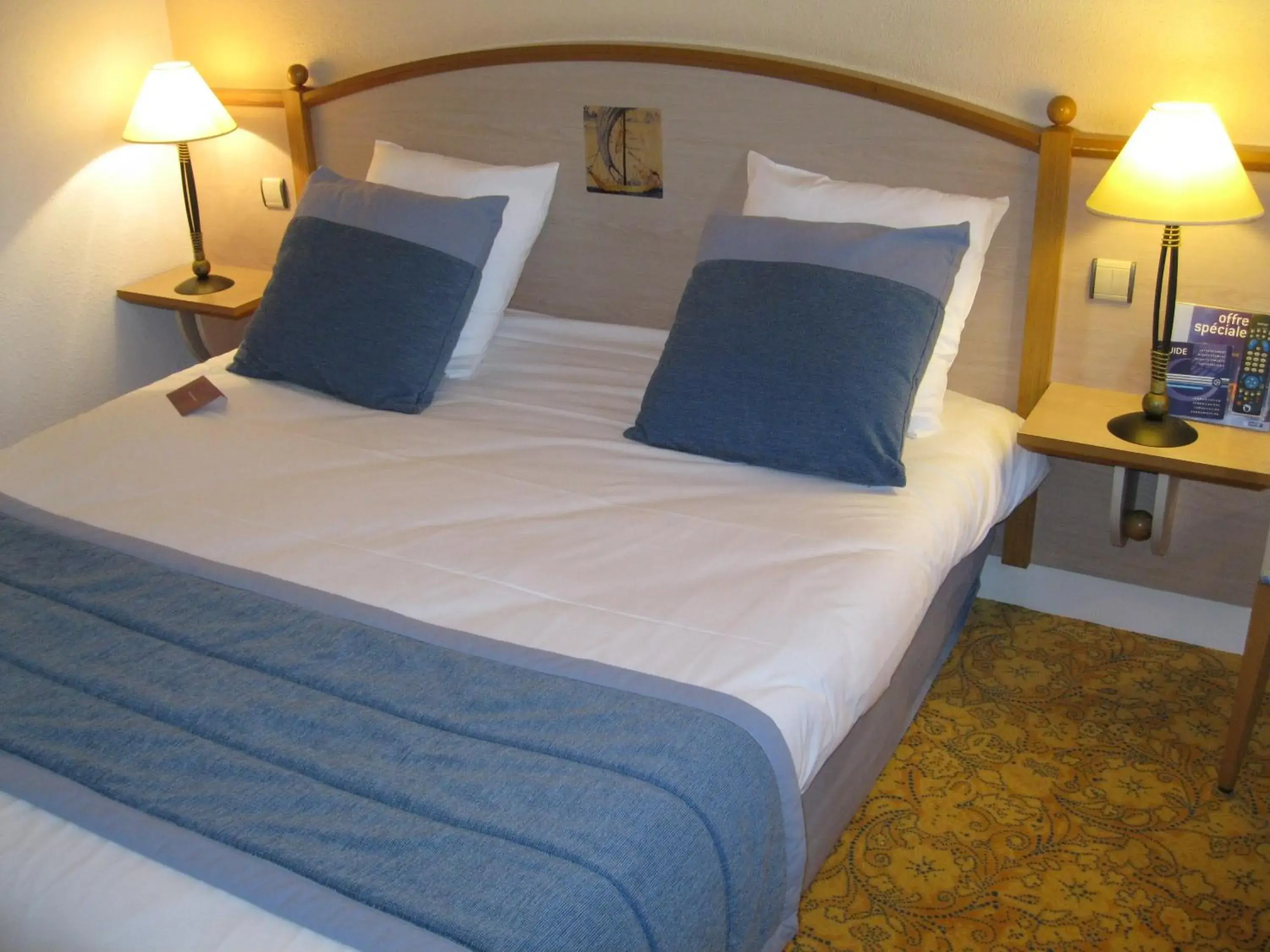 Bed in Hotel Mercure Nevers Pont de Loire