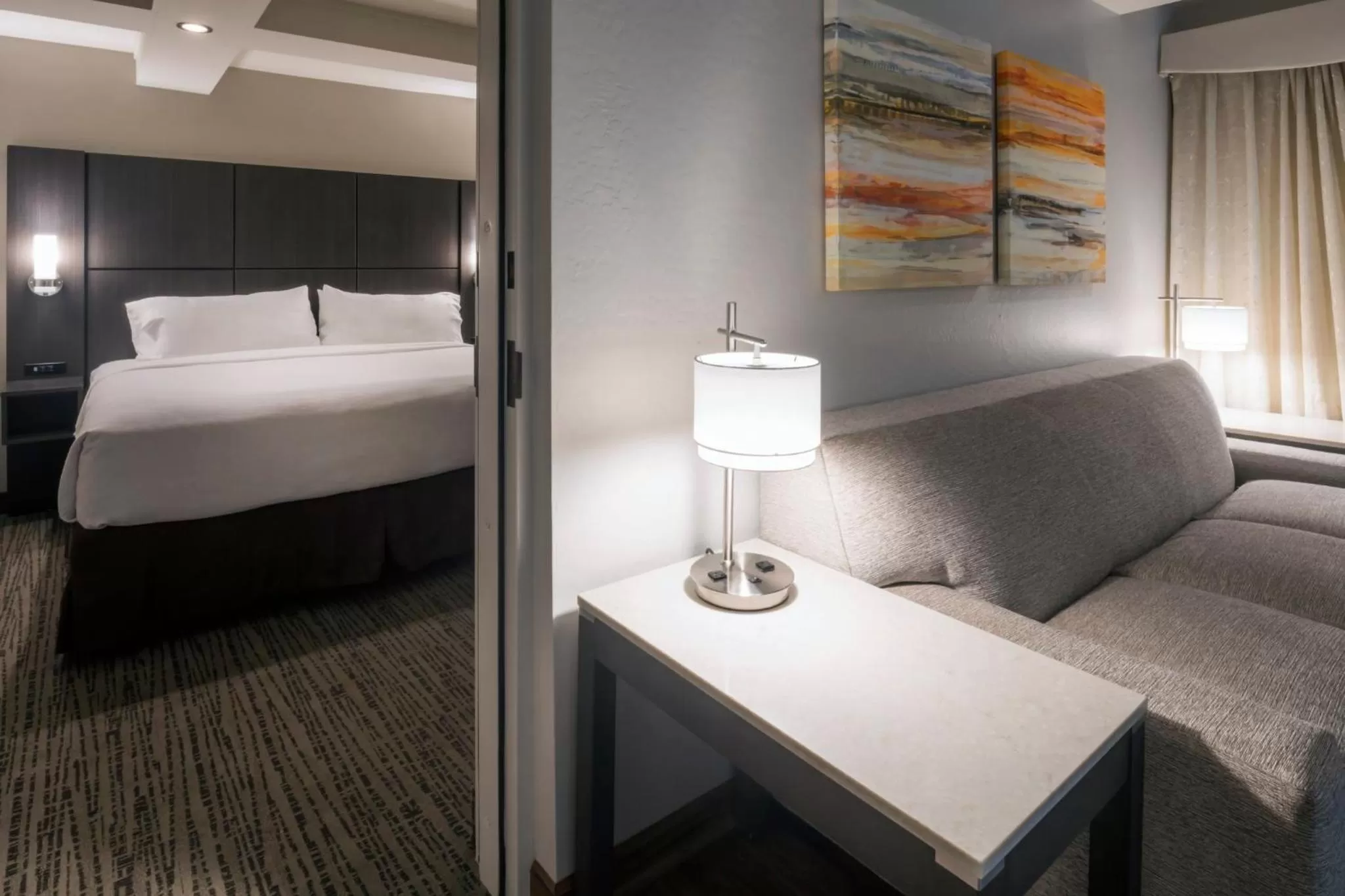 Photo of the whole room, Bed in Holiday Inn and Suites Phoenix Airport North by IHG