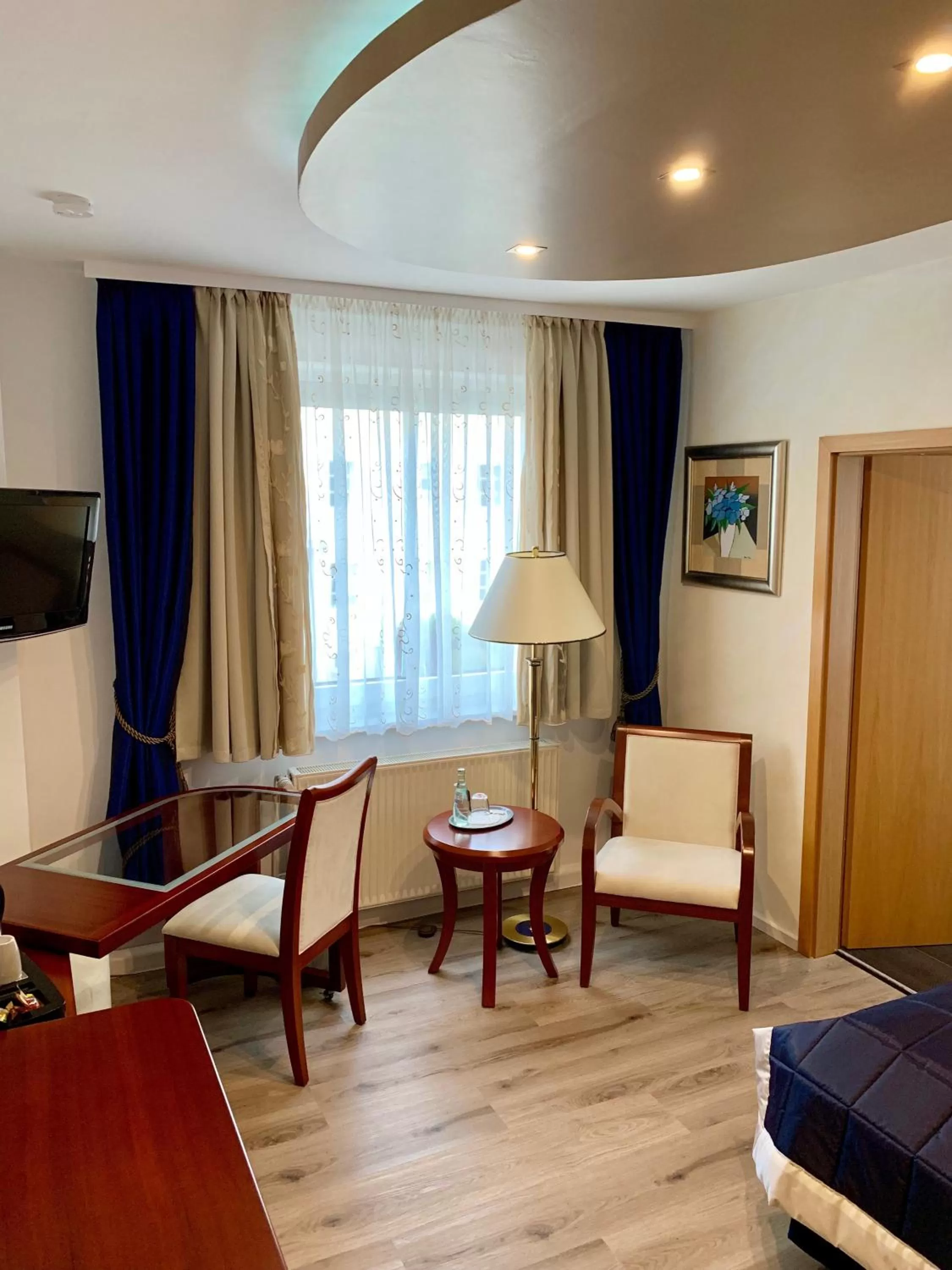 Seating area, Bed in Boutique Hotel Goldene Henne