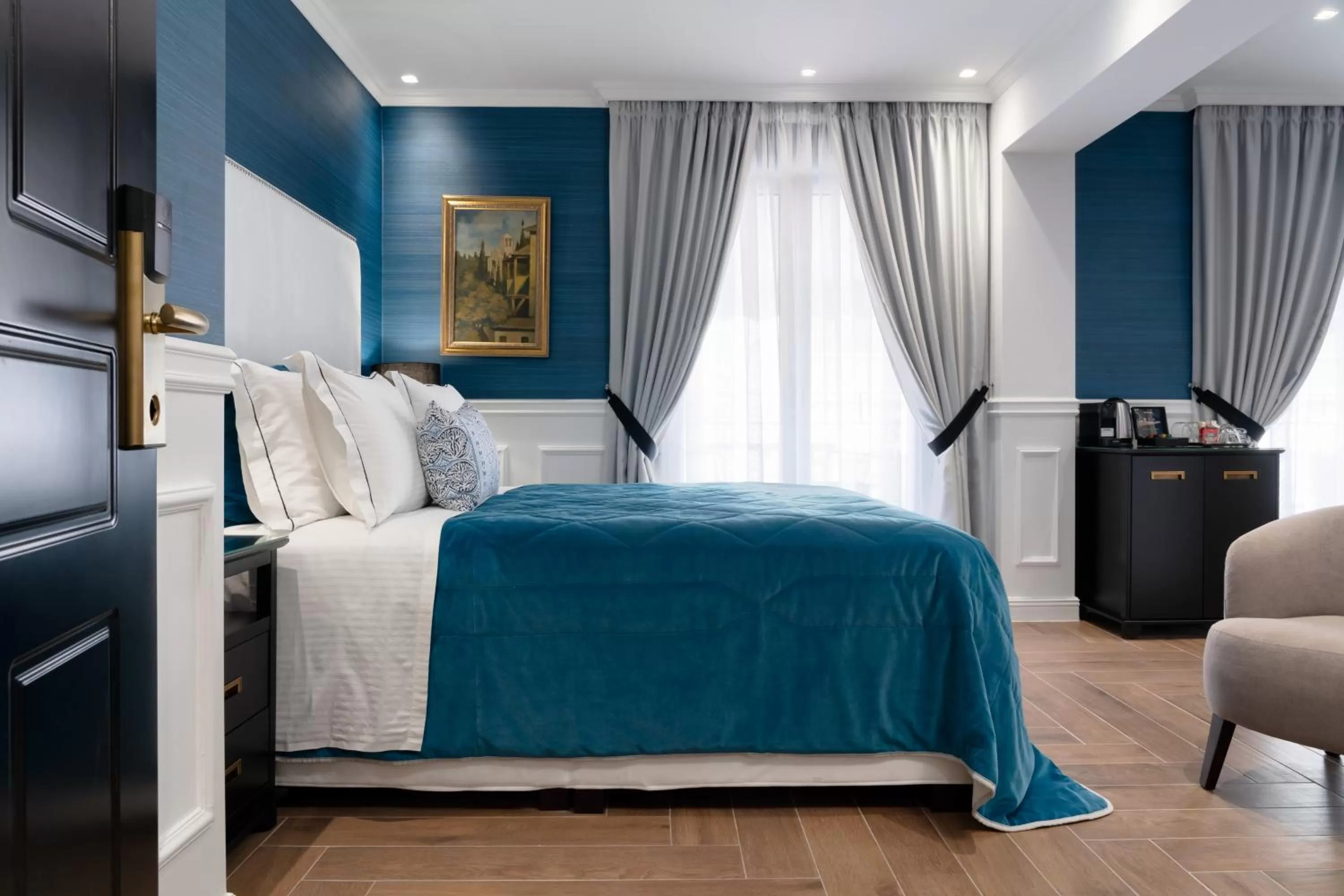 Bed in Evripidou Suites