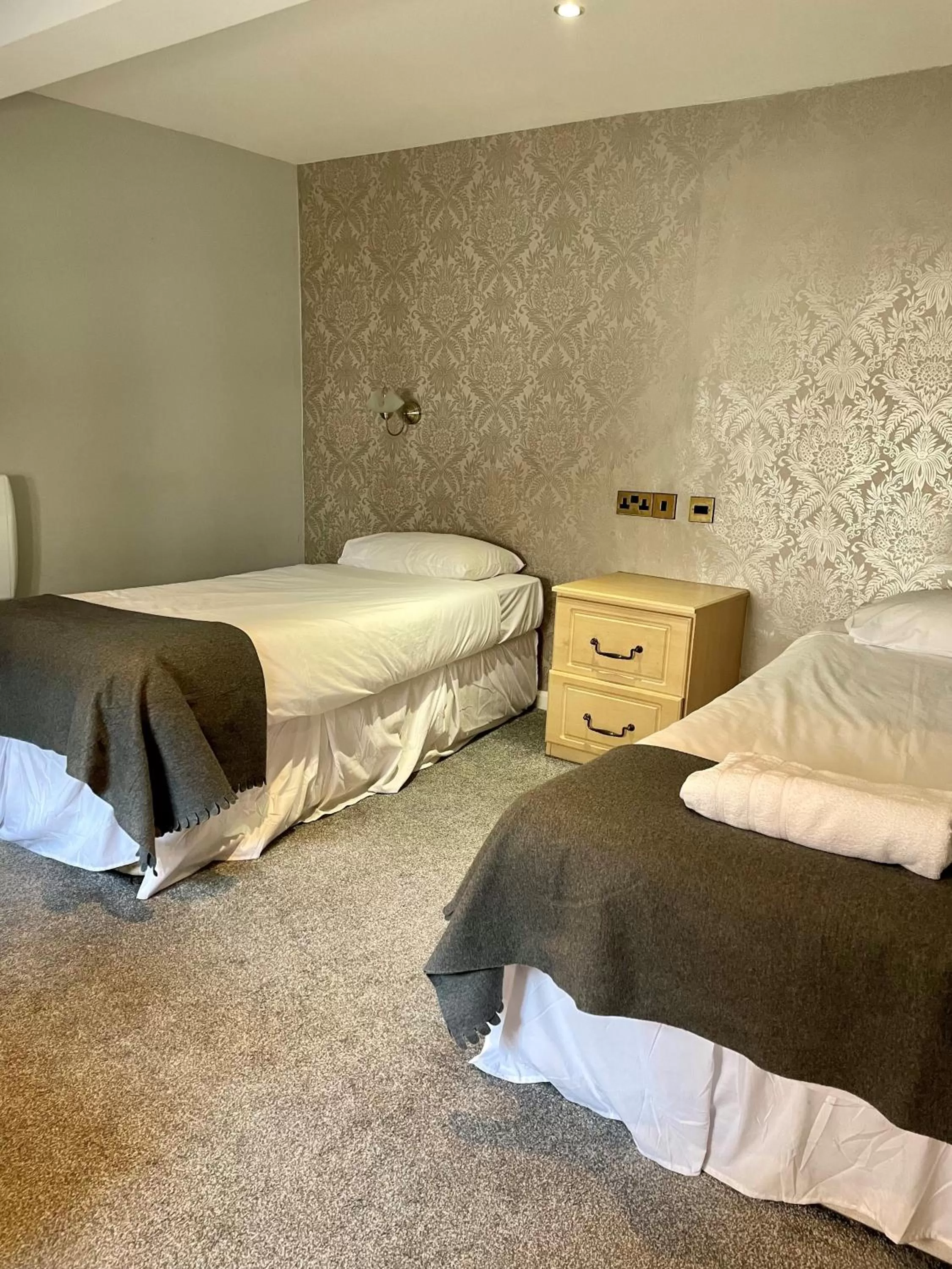 Bed in Donington Manor Hotel