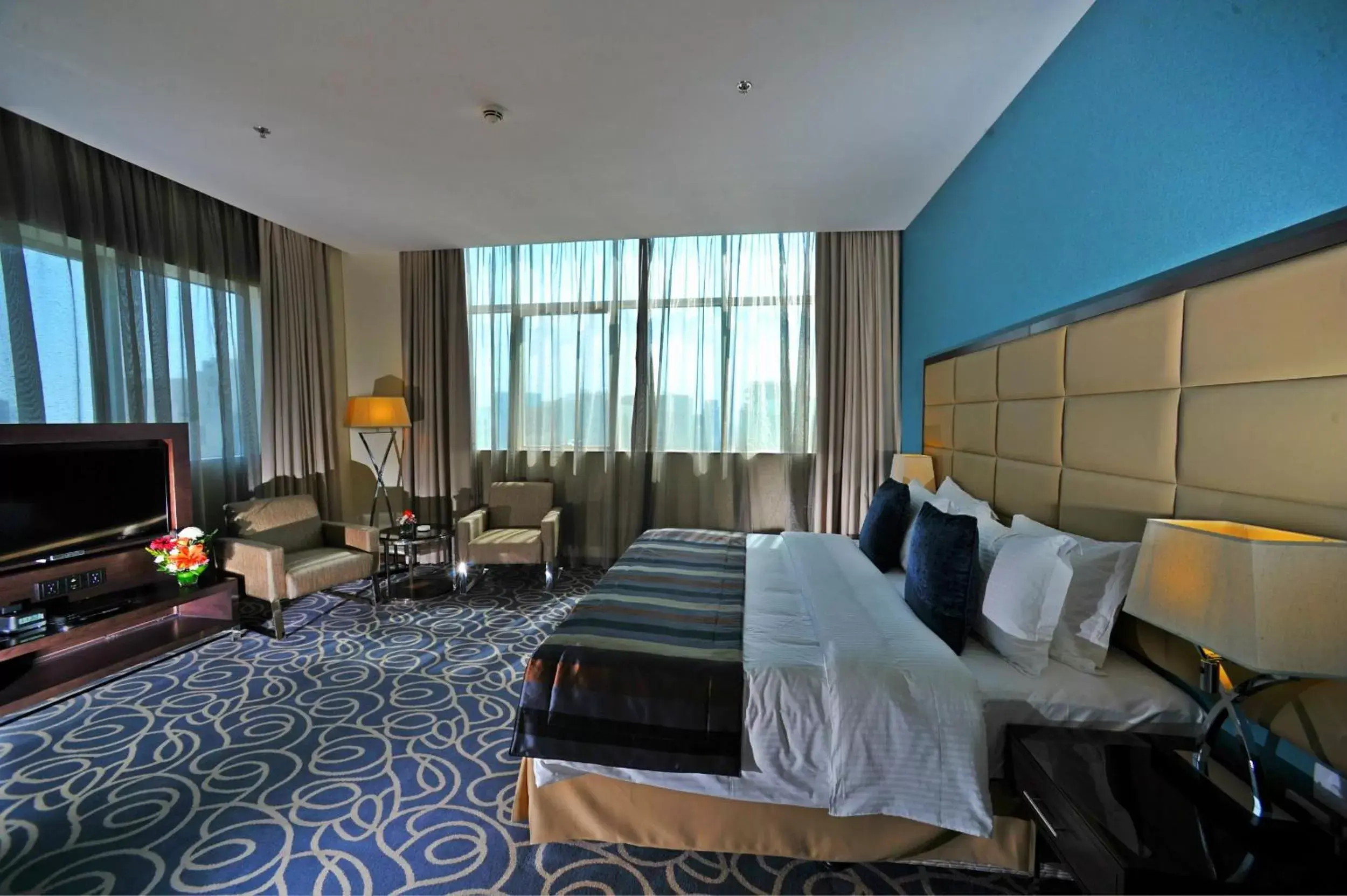 Bedroom, TV/Entertainment Center in Ramada Abu Dhabi Corniche