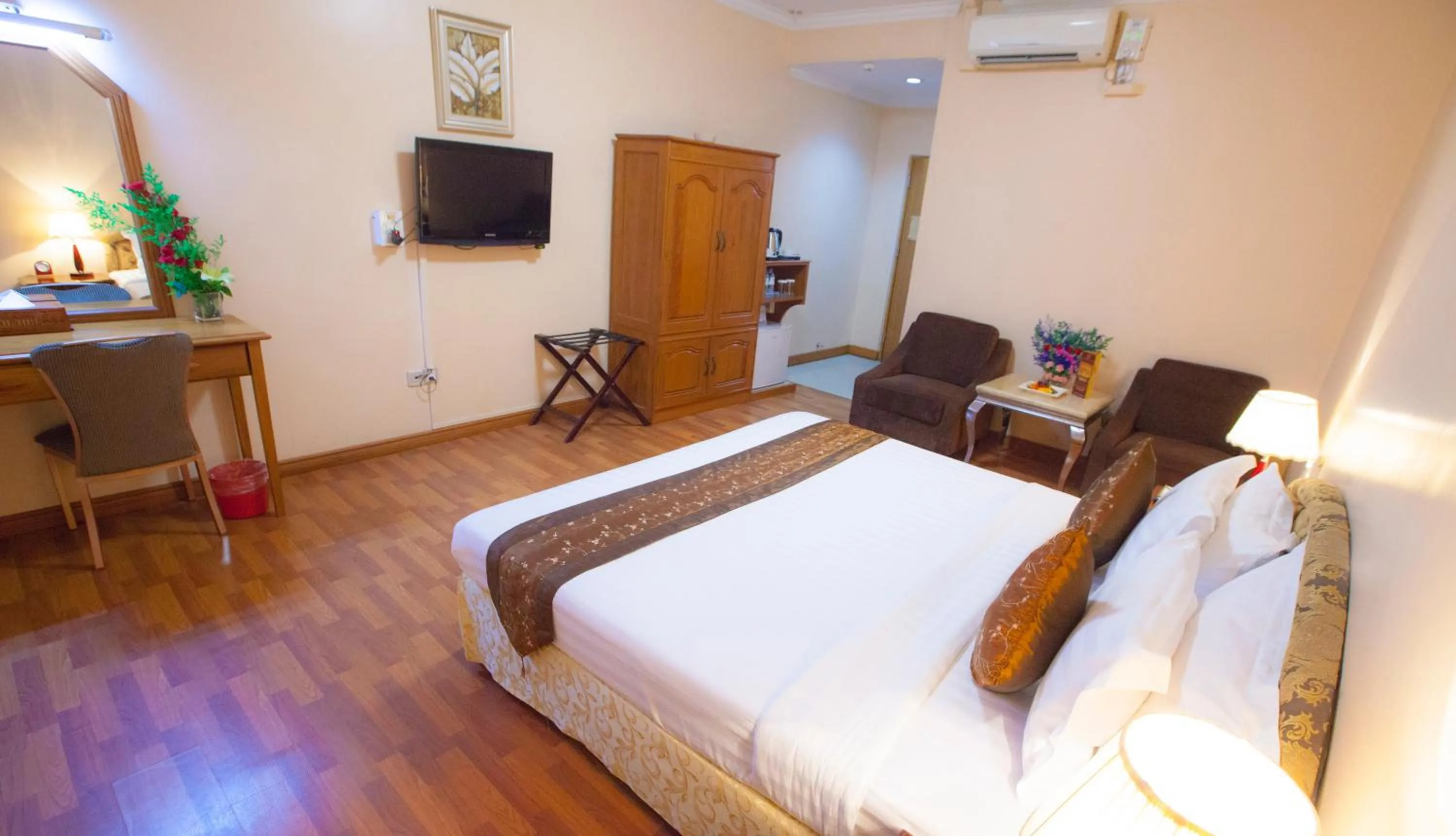 Bed in Grand Palace Hotel