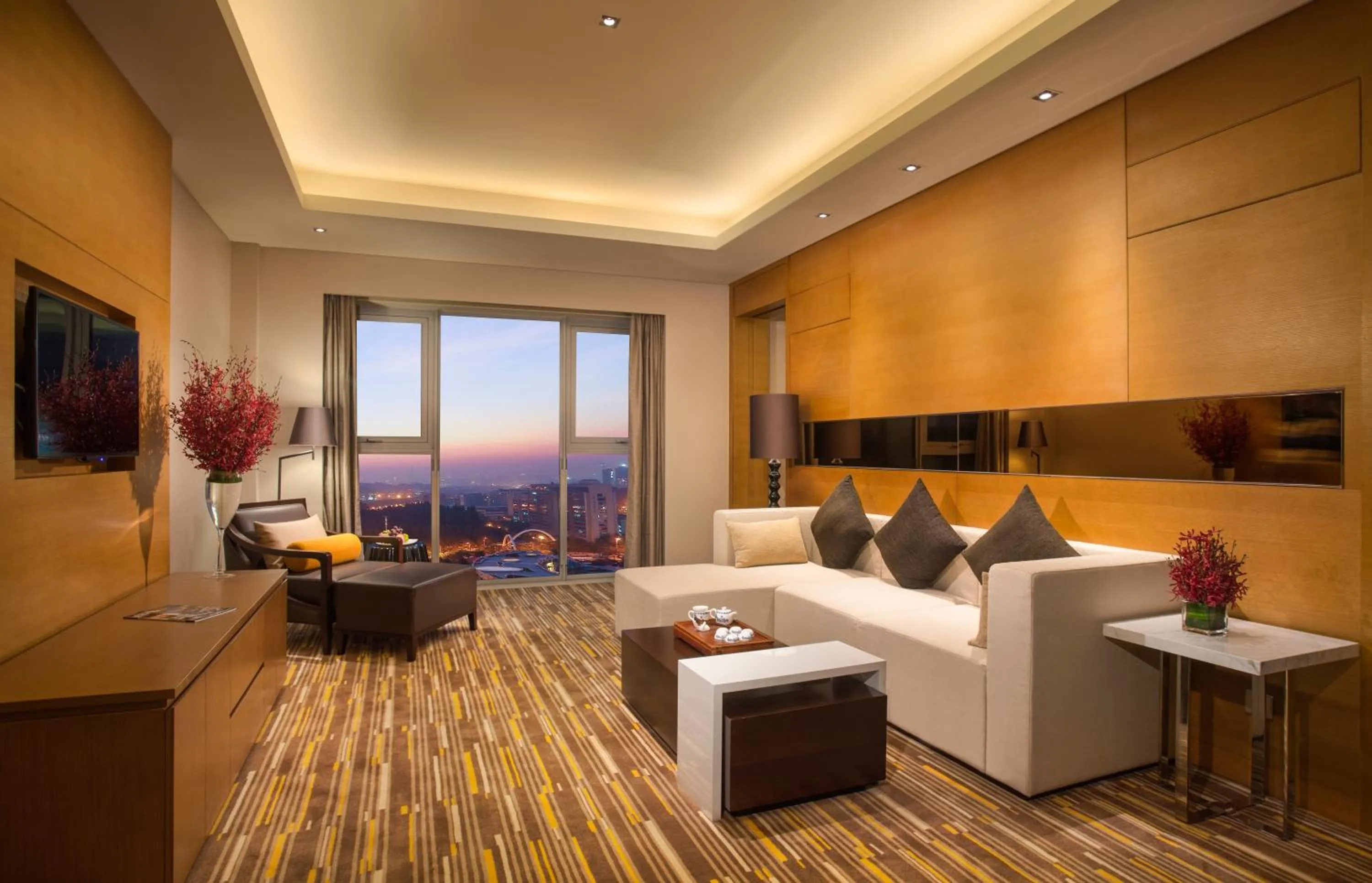 Living room in Junluxe Hotel Guangzhou Science City-Free Shuttle Bus Service to Guangzhou Canton Fair