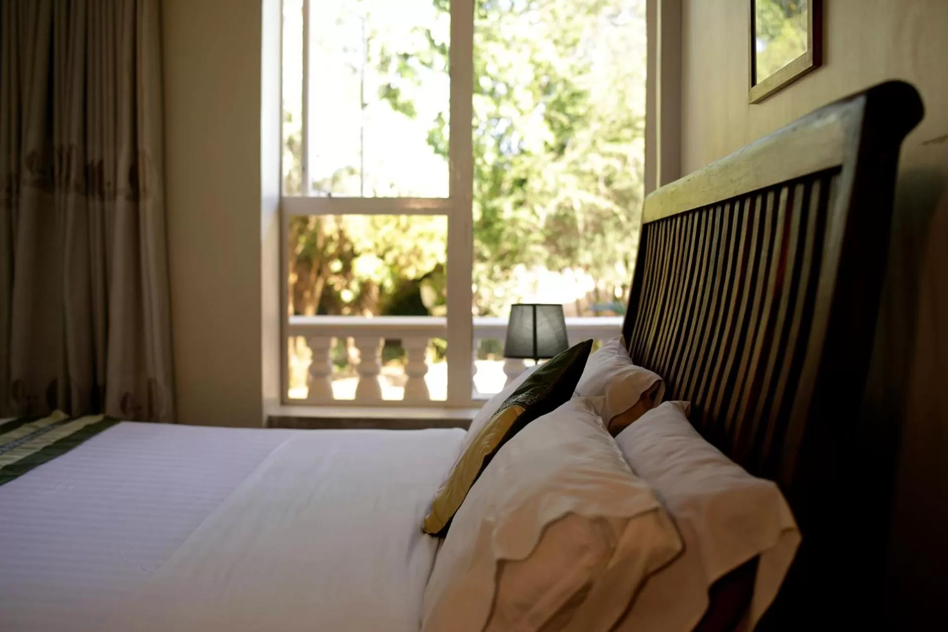 Bed in Entebbe Palm Hotel