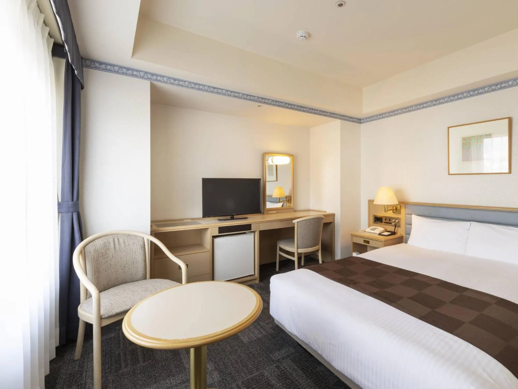 Bed in Hotel Sapporo Garden Palace