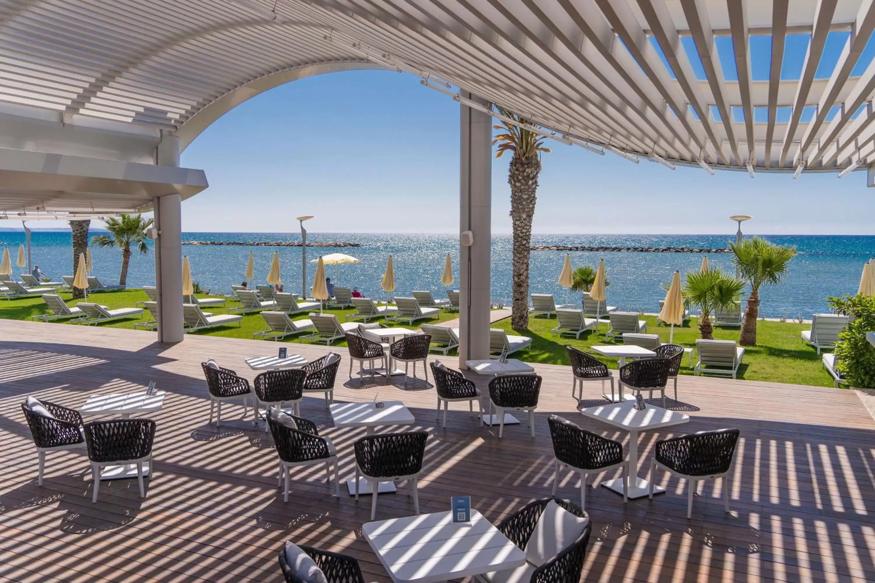 Pool view, Restaurant/Places to Eat in Radisson Beach Resort Larnaca