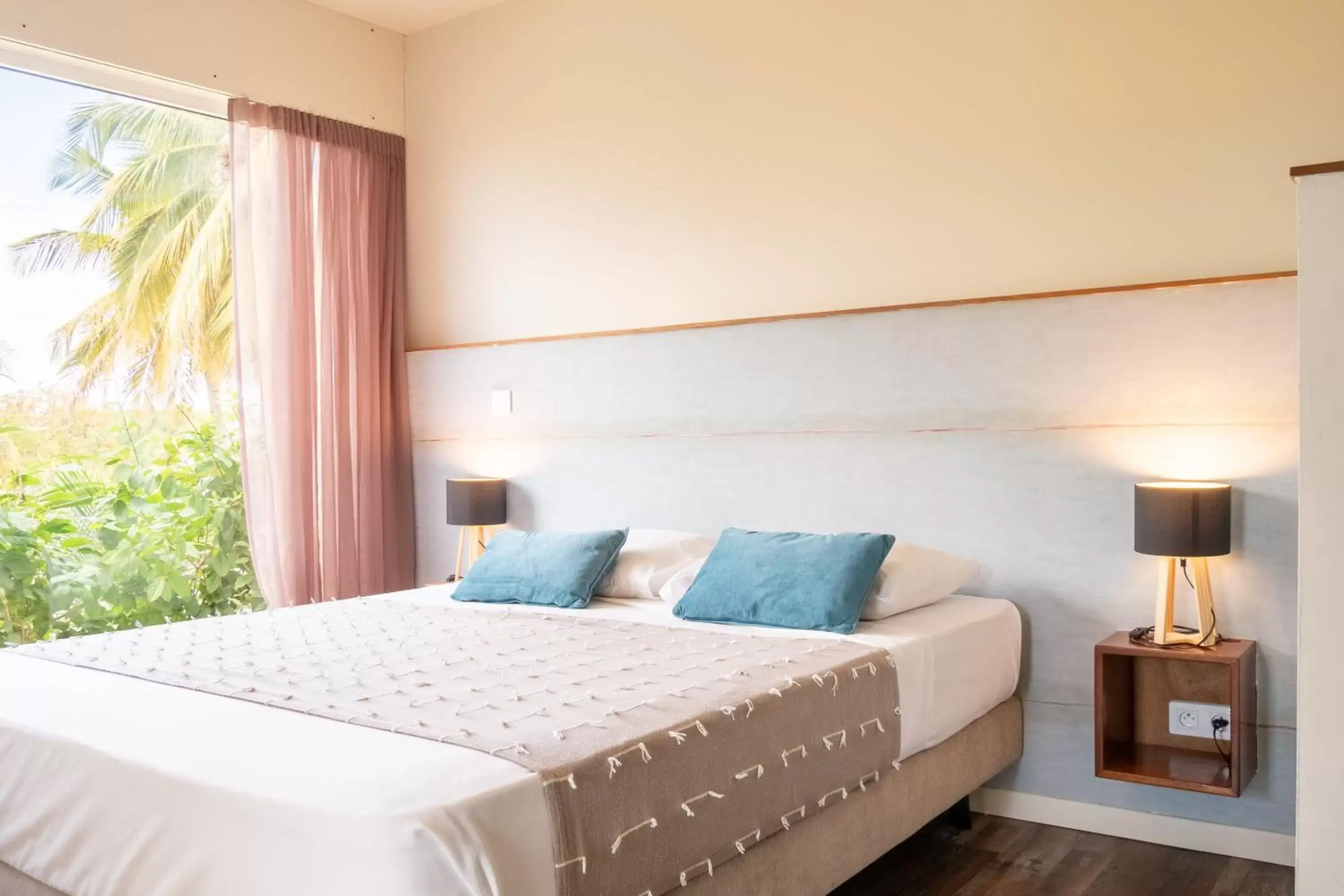 Photo of the whole room, Bed in Hotel ILOMA Corail Residence
