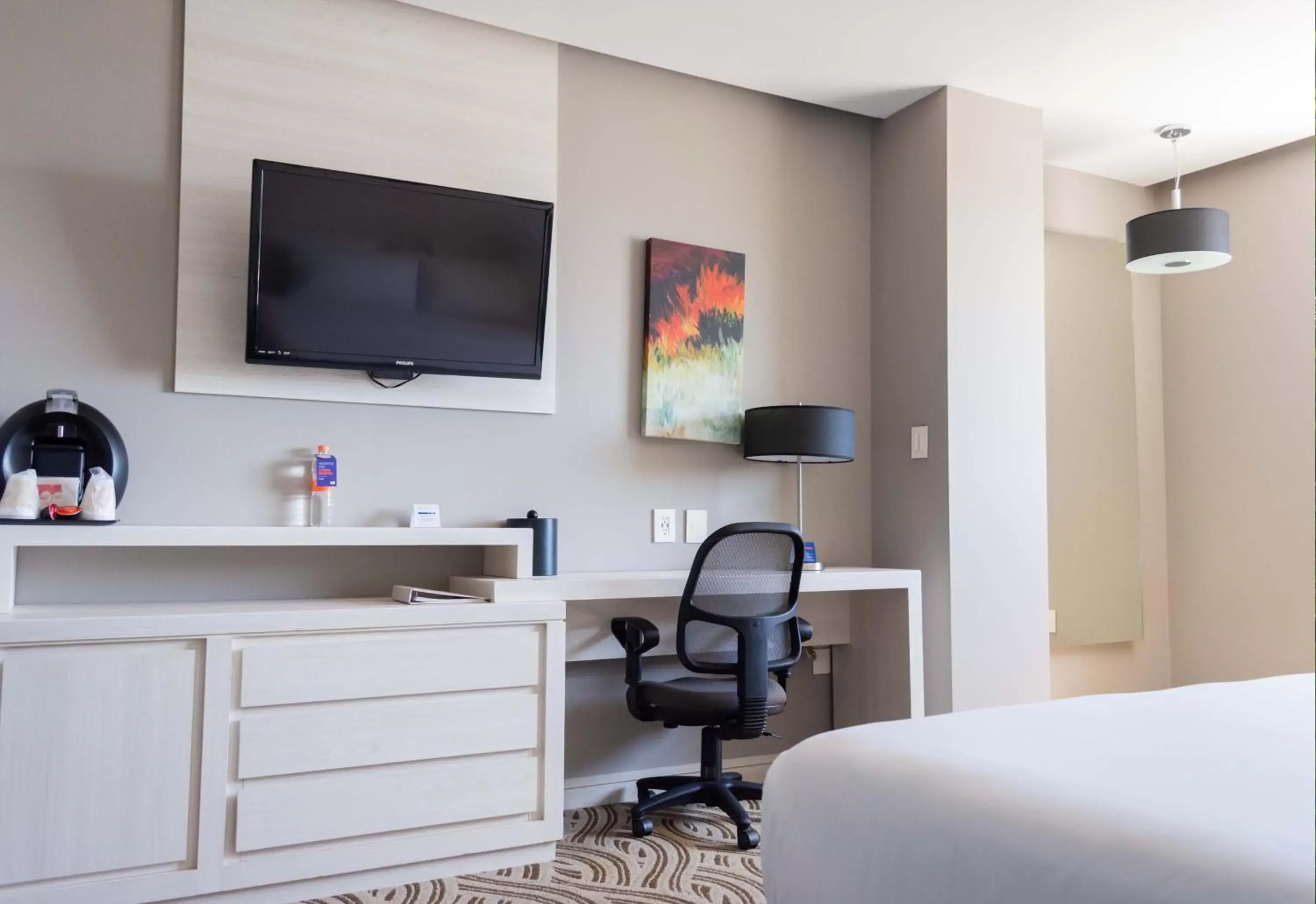 Photo of the whole room, TV/Entertainment Center in Holiday Inn Express Pachuca, an IHG Hotel