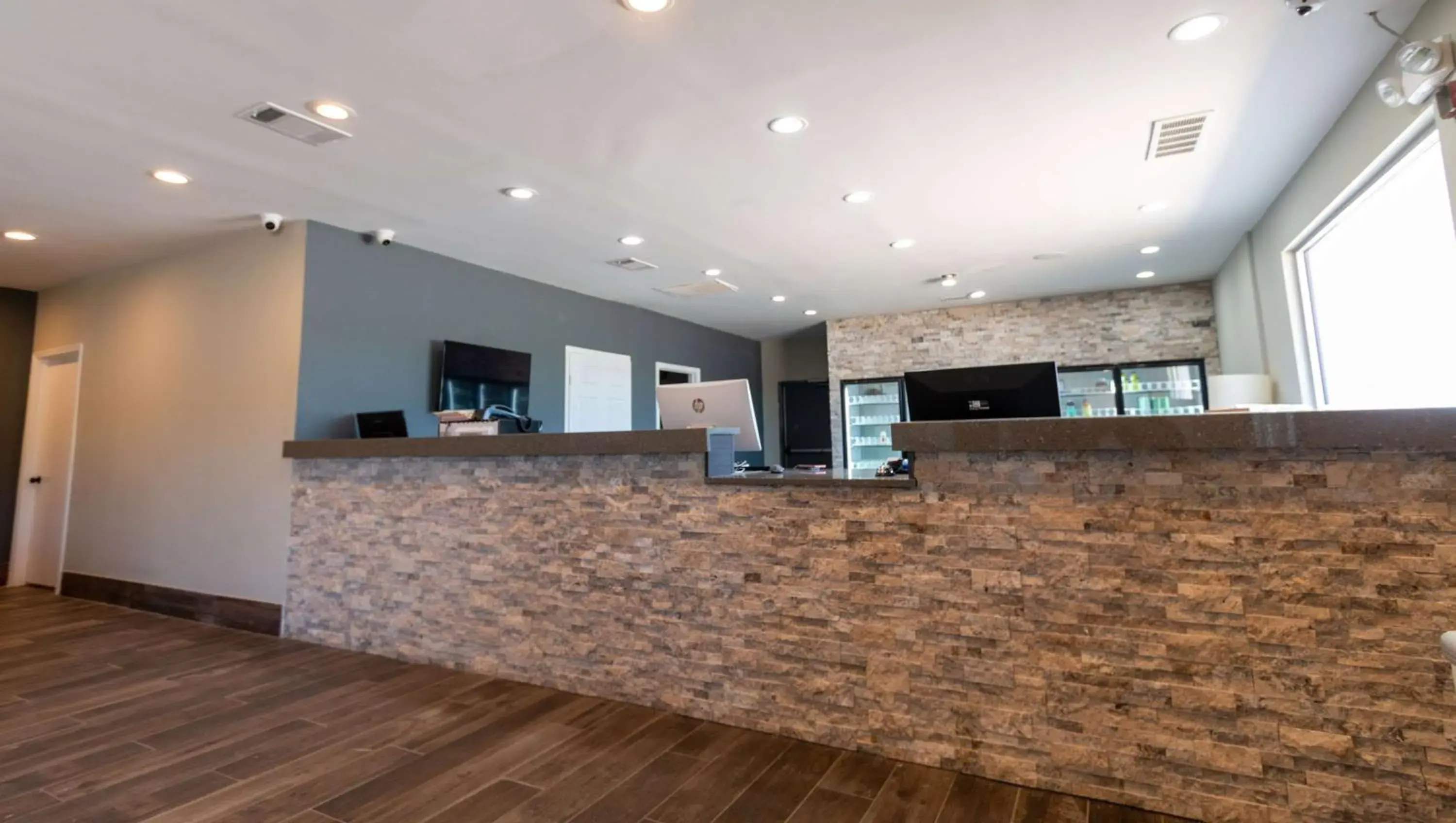 Lobby or reception in Magnuson Extended Stay and Suites Airport Hotel Lobby or reception in Magnuson Extended Stay and Suites Airport Hotel