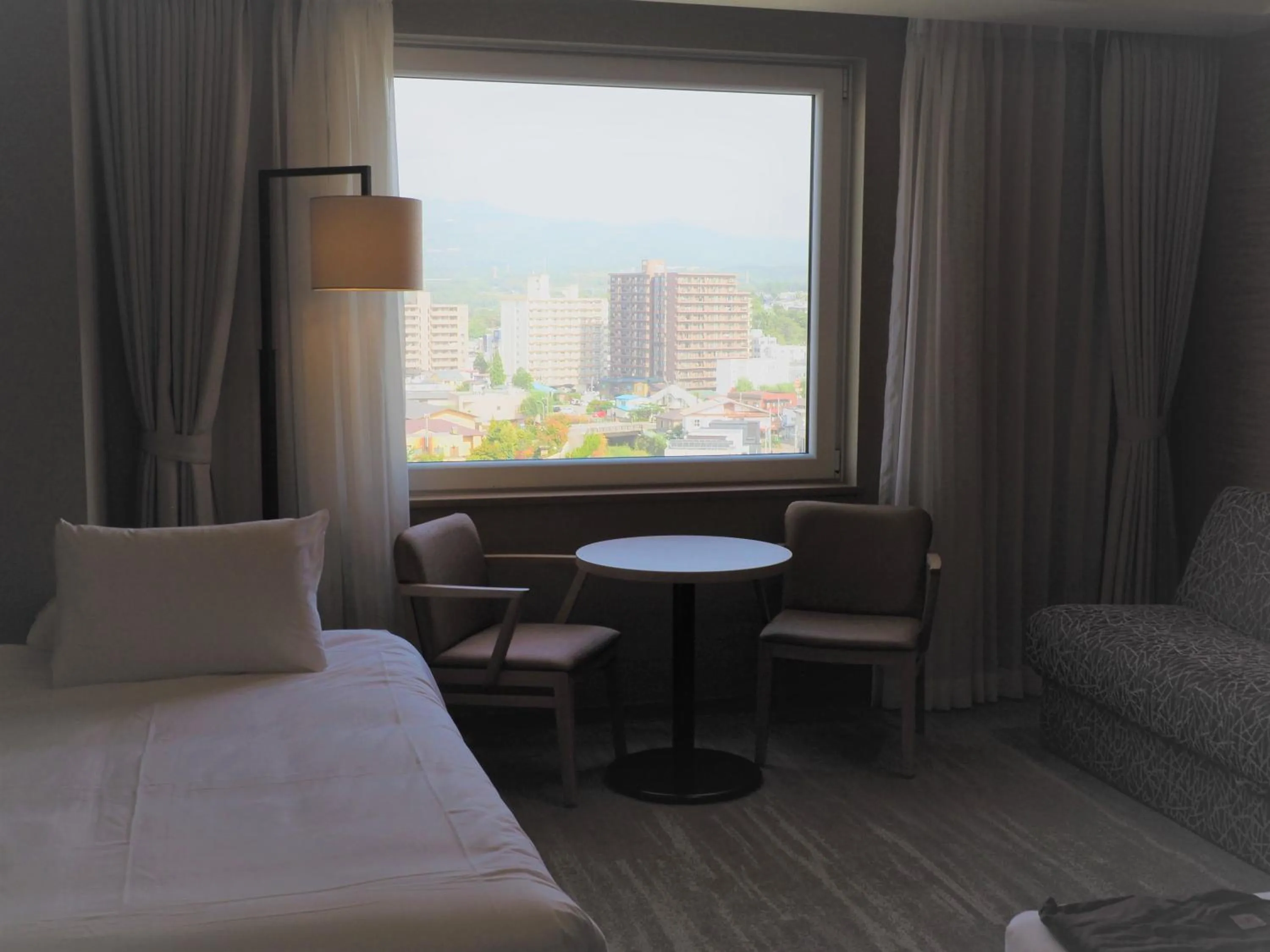 View (from property/room), Bed in Hakodate Yunokawa Onsen Umi to Akari Hewitt Resort