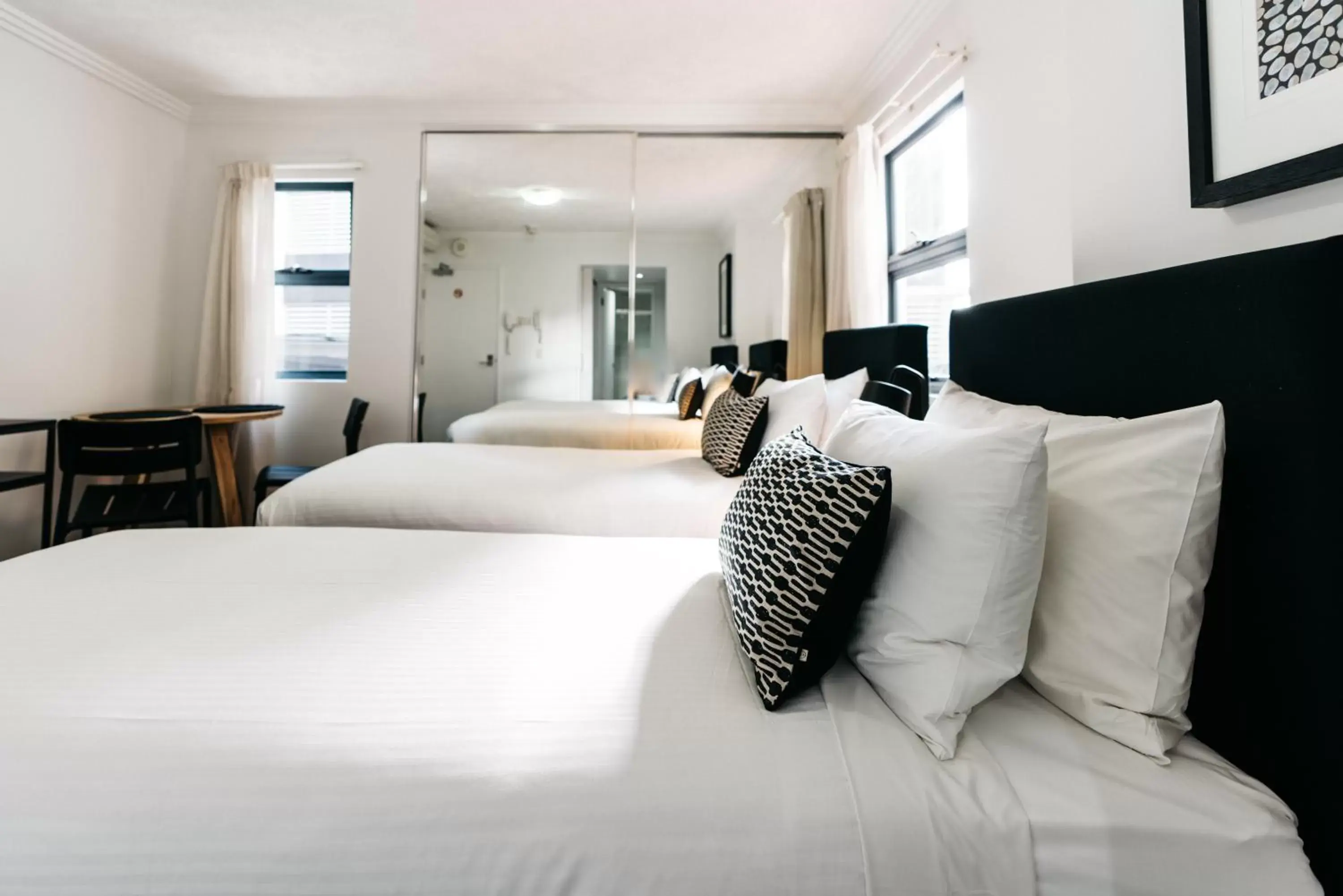 Dining area, Bed in Gabba Central Apartments