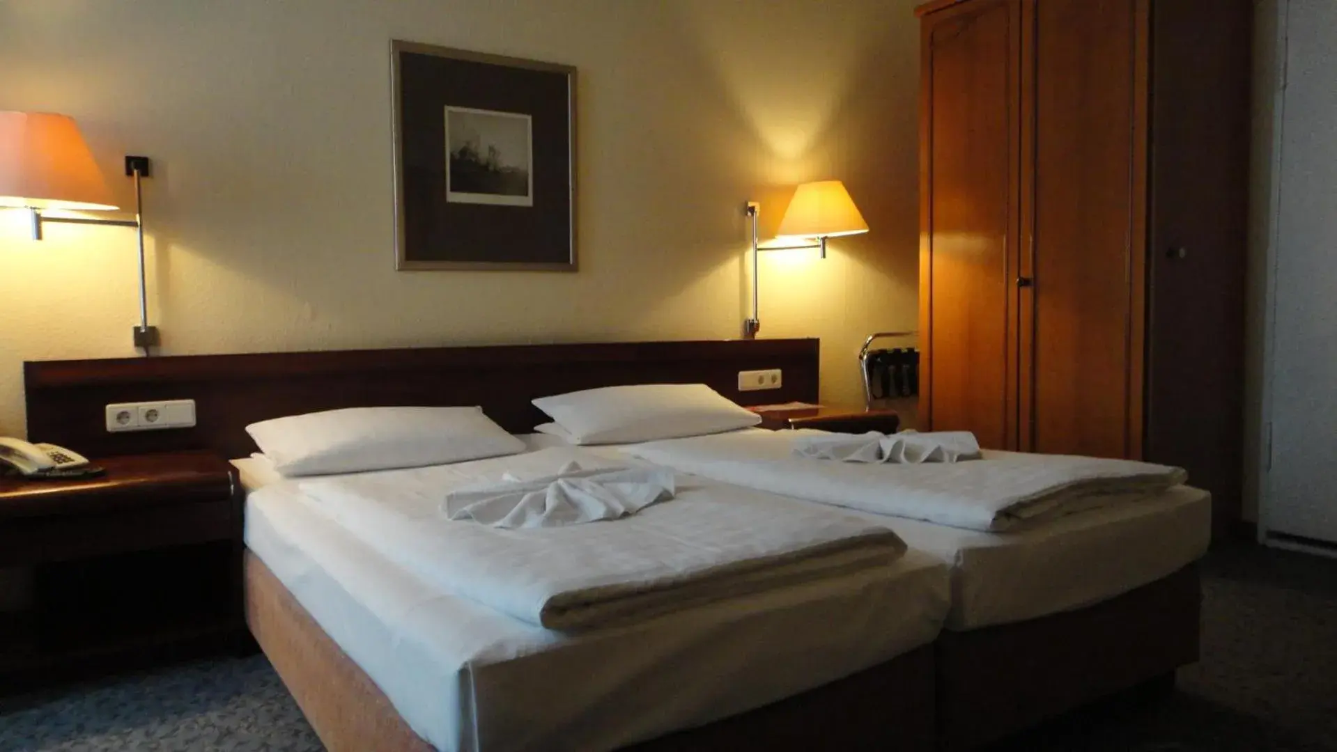 Bed in Hotel Pension Xantener Eck