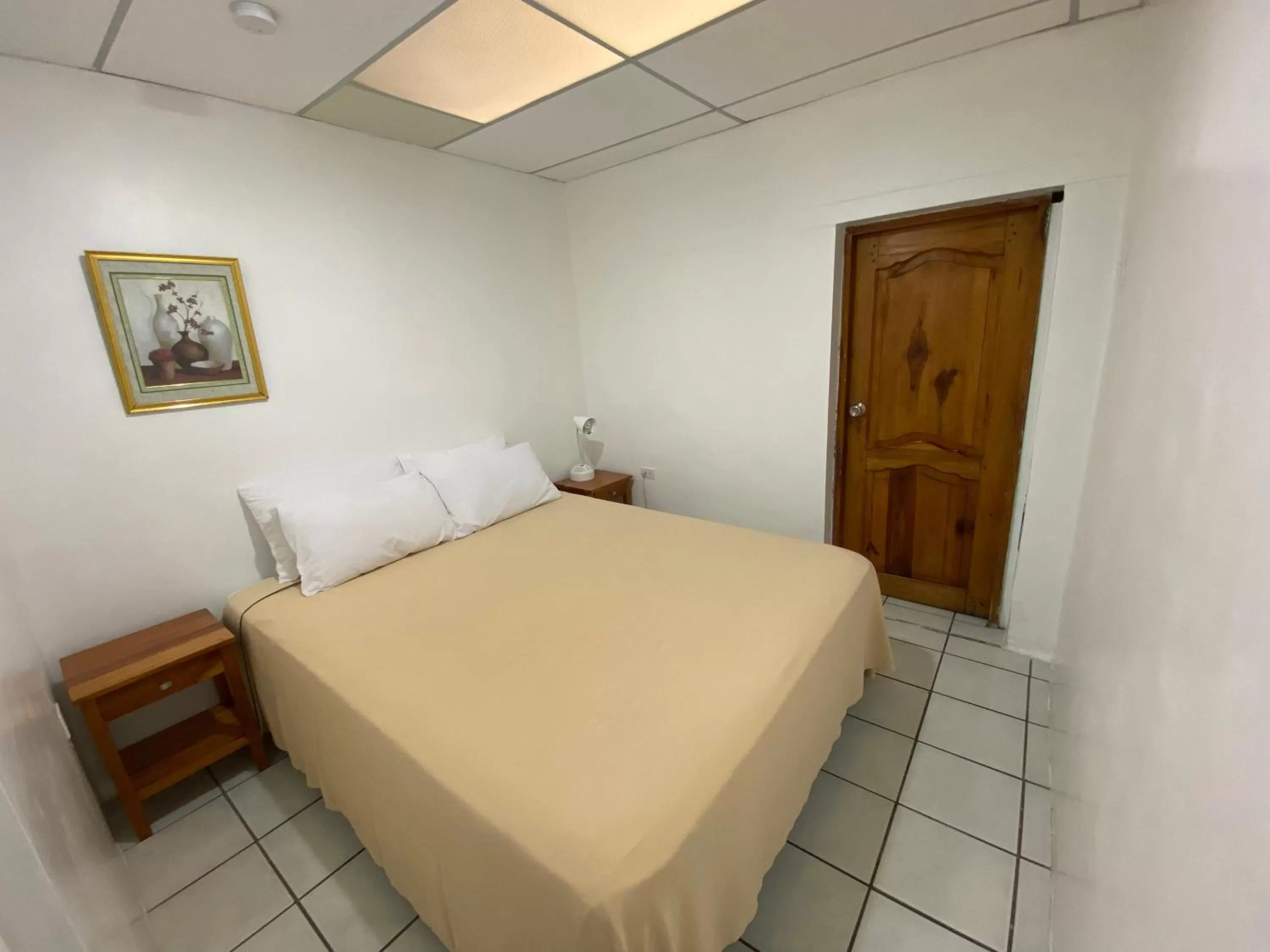 Bed in La Peregrina Galapagos B&B