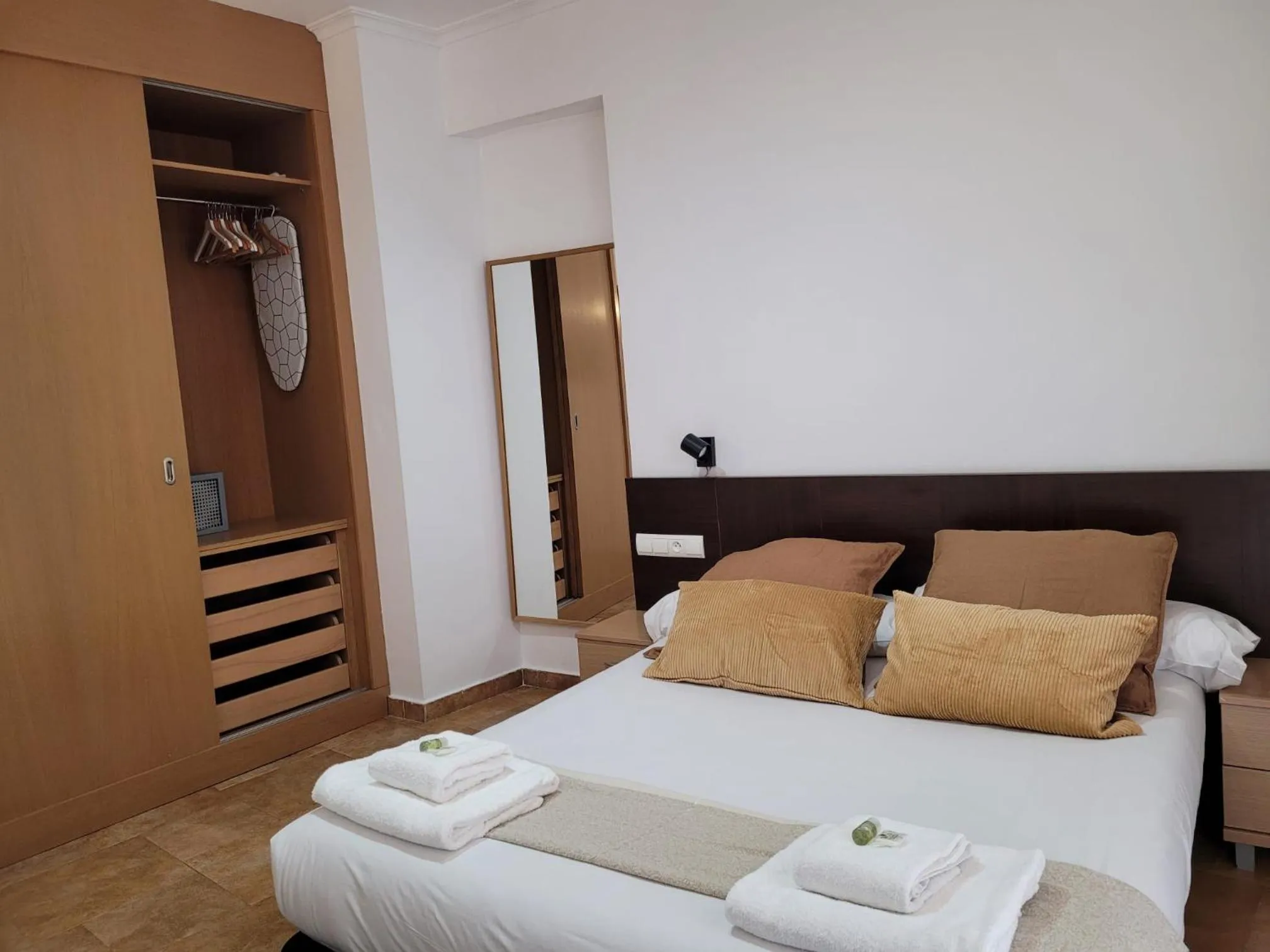 Bed in Living Valencia Apartments - Merced