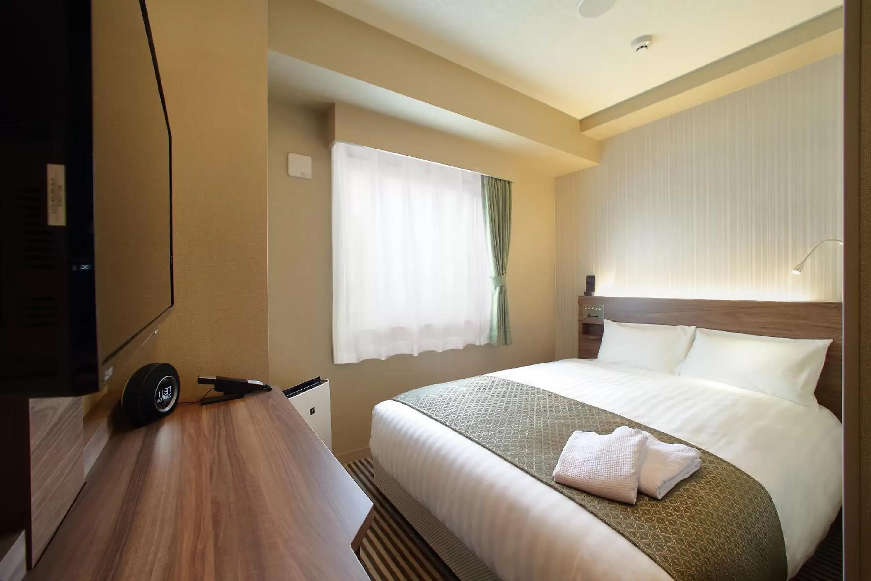 Bed in Hotel Oriental Express Osaka Shinsaibashi Bed in Hotel Oriental Express Osaka Shinsaibashi