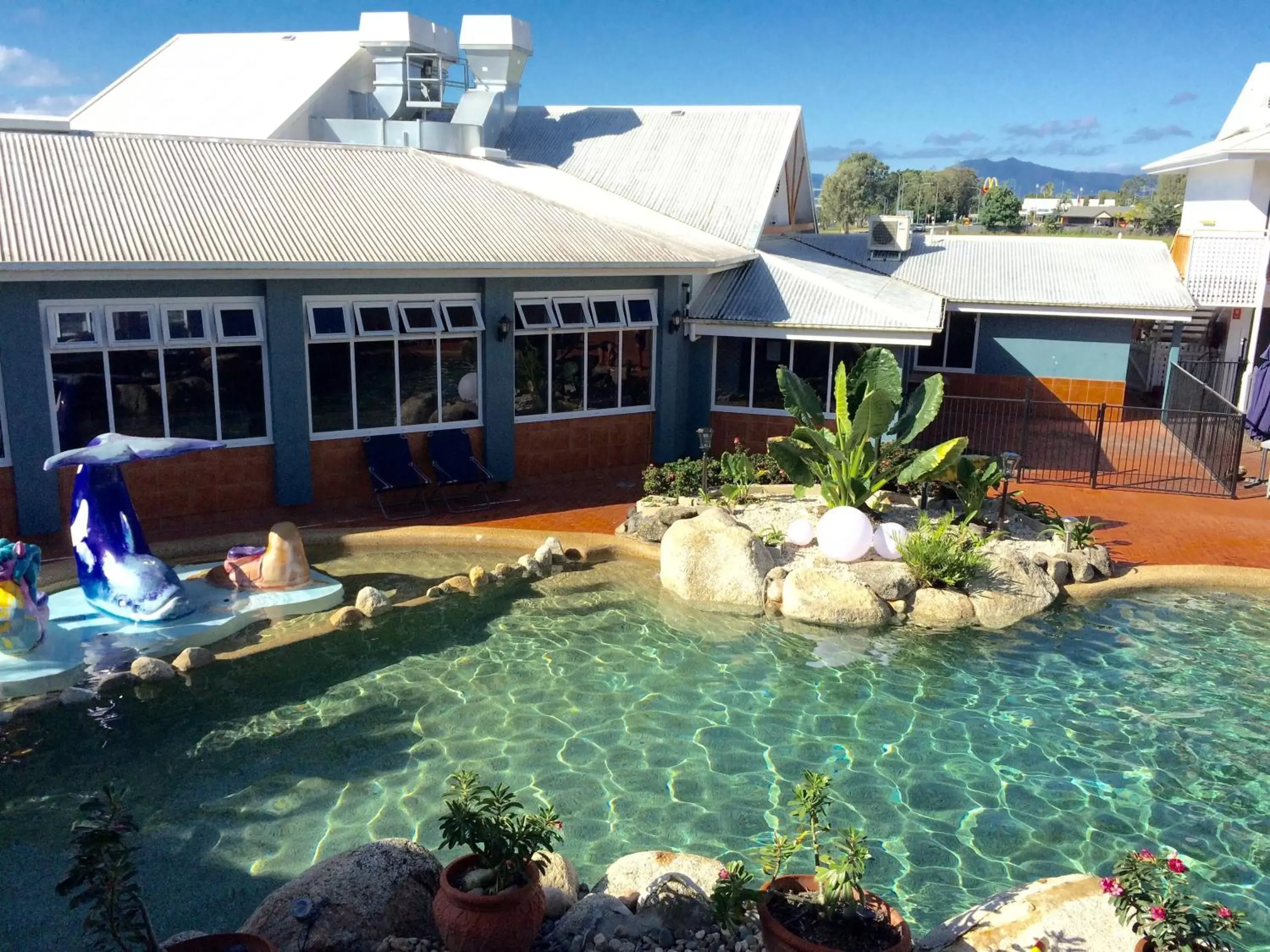 Swimming pool, Property Building in South Cairns Resort