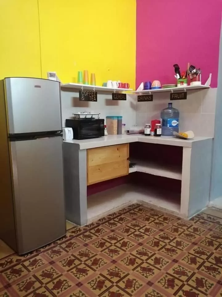 Kitchen or kitchenette in Hostal Xiinbal
