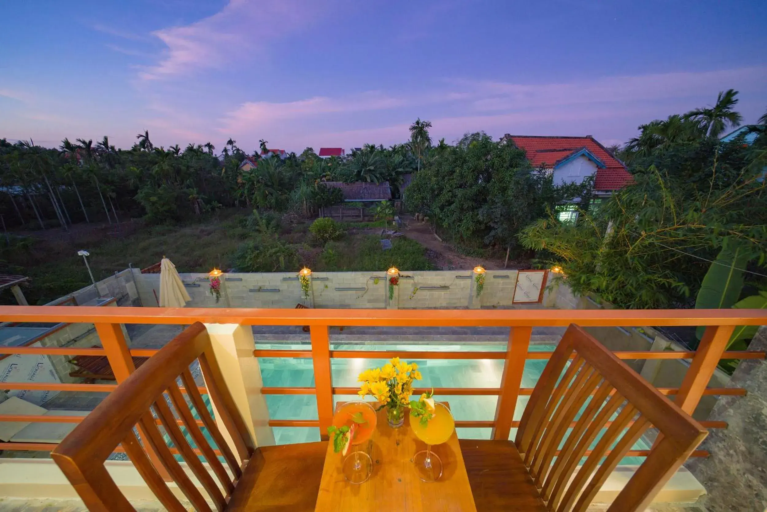 Balcony/Terrace, Pool View in Herbal Tea Homestay