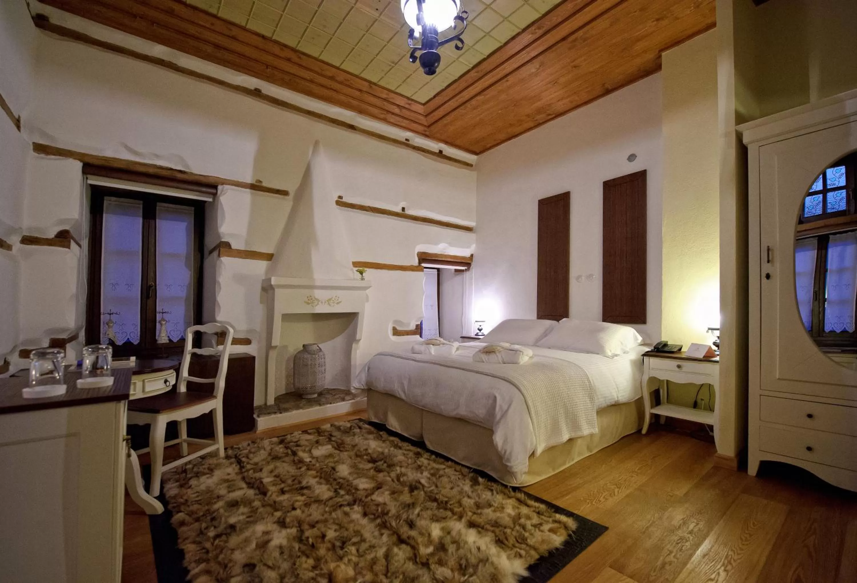 Bed in Orologopoulos Mansion Luxury Hotel