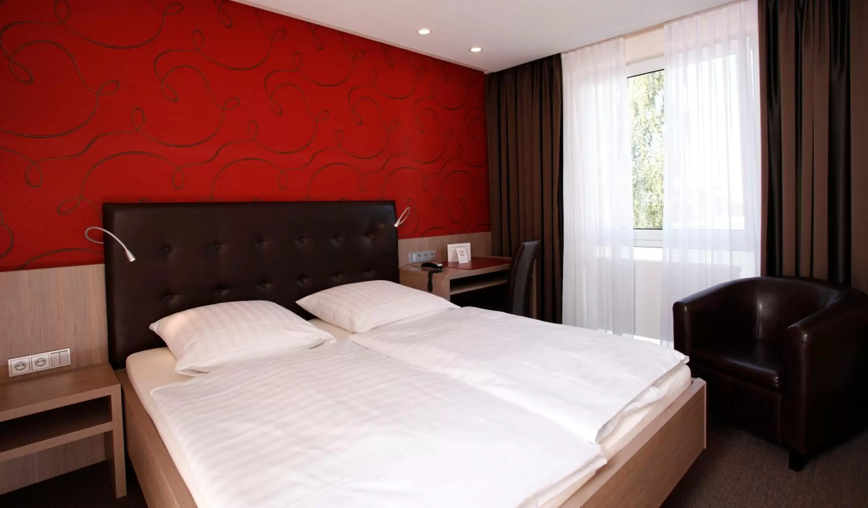 Bed in Hotel Rennschuh