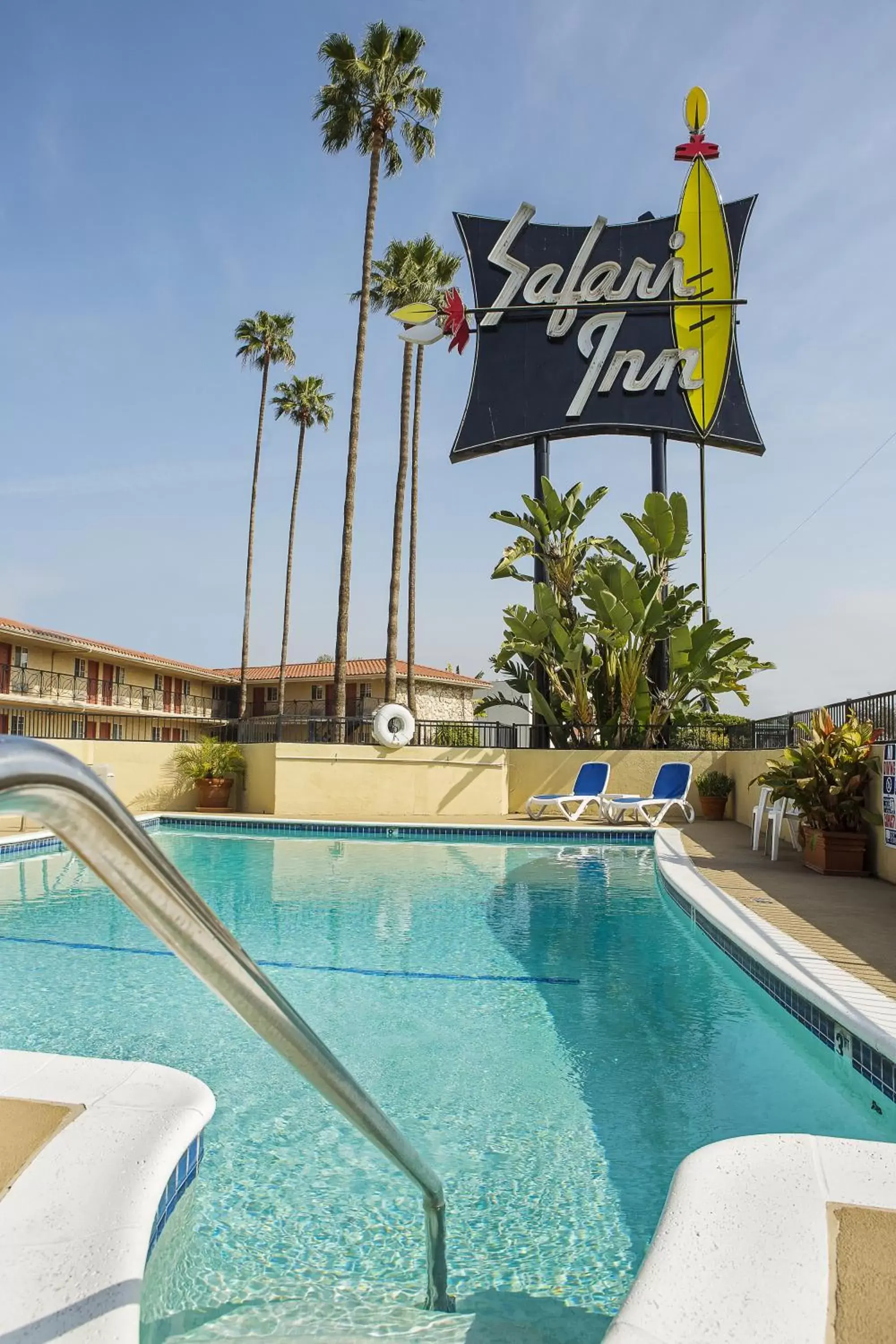 Day, Swimming Pool in Safari Inn, a Coast Hotel