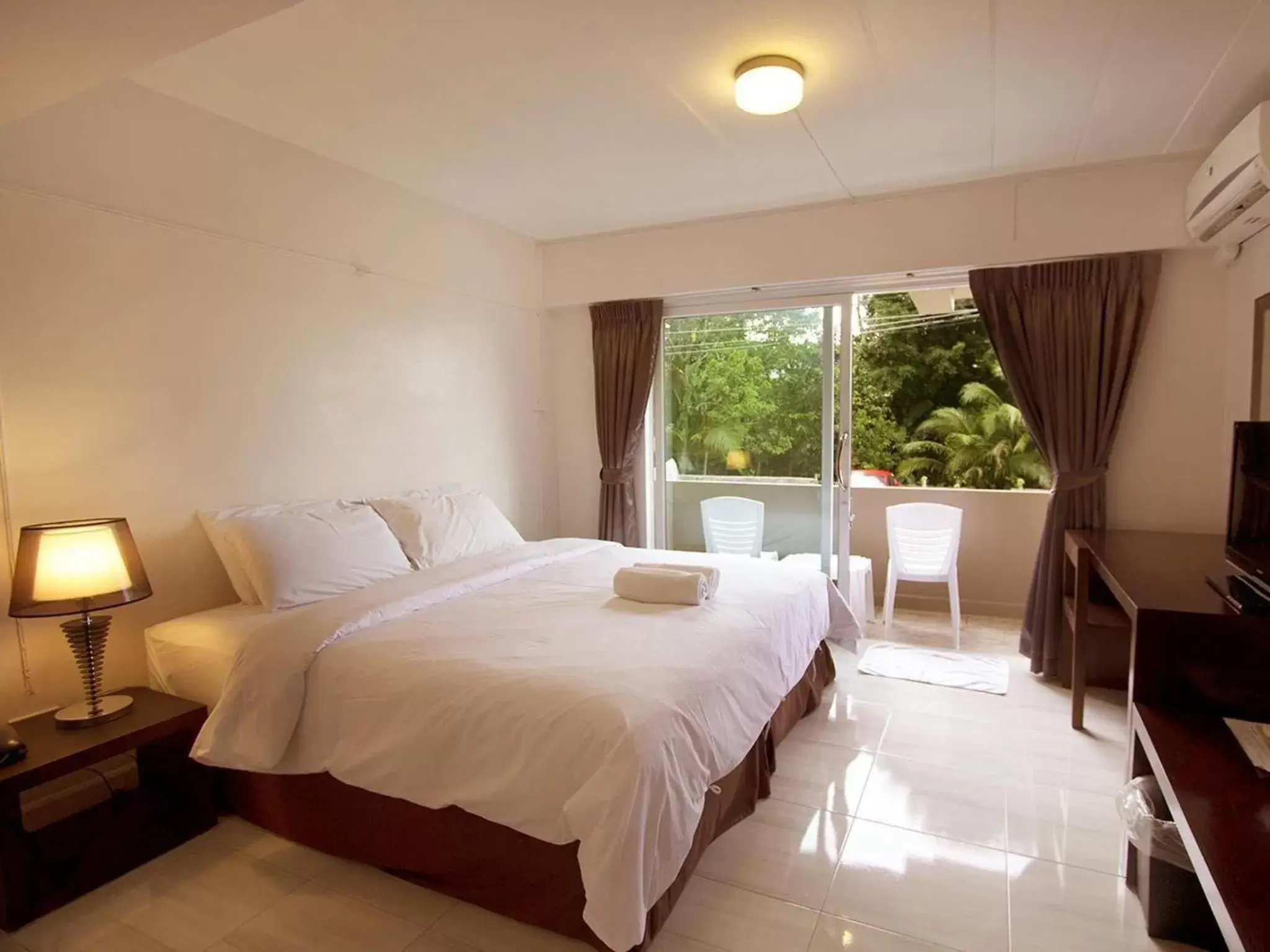 Bed in The Farm House Hotel Ranong