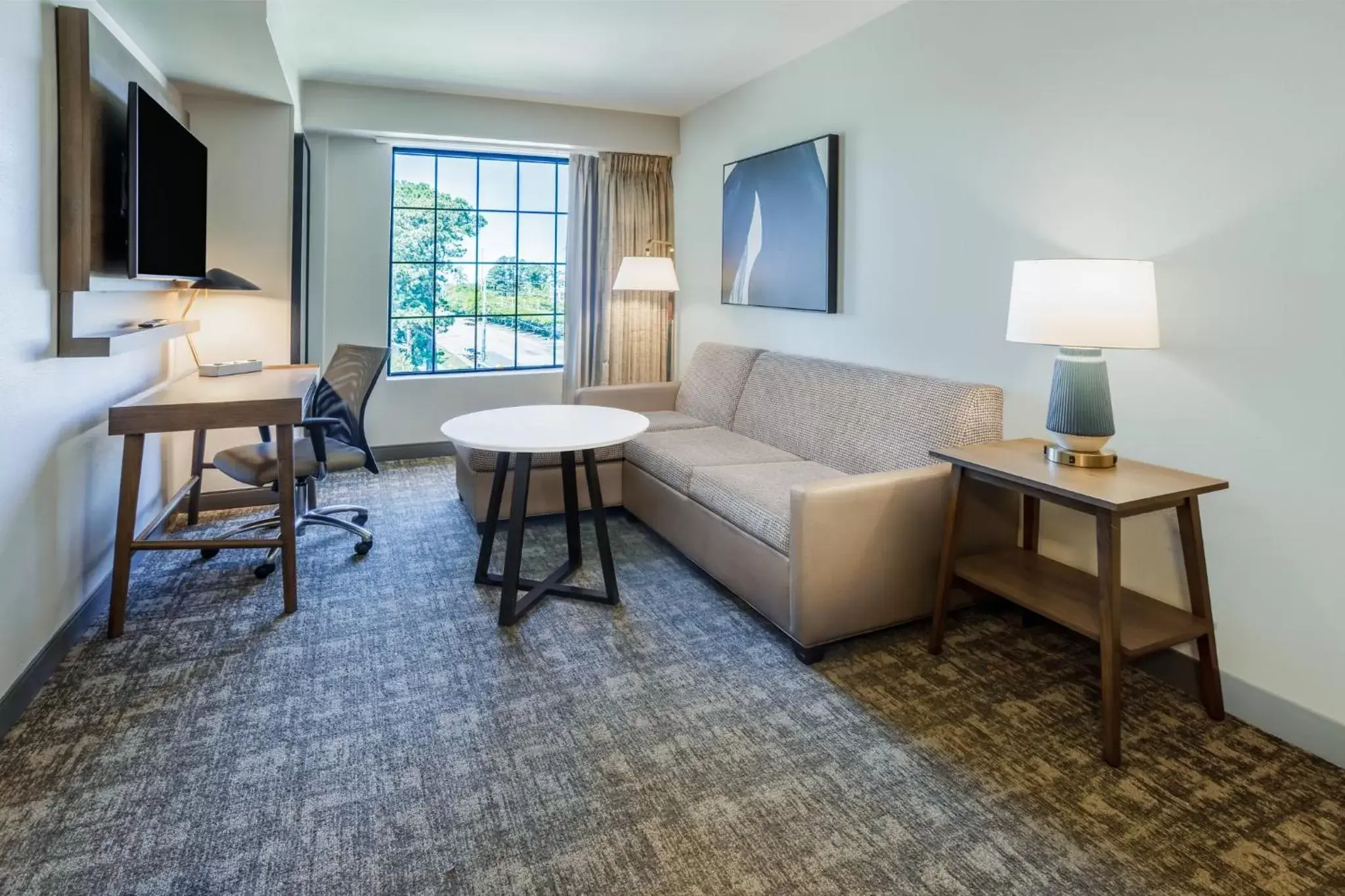 Photo of the whole room, Seating Area in Staybridge Suites Wilmington East, an IHG Hotel