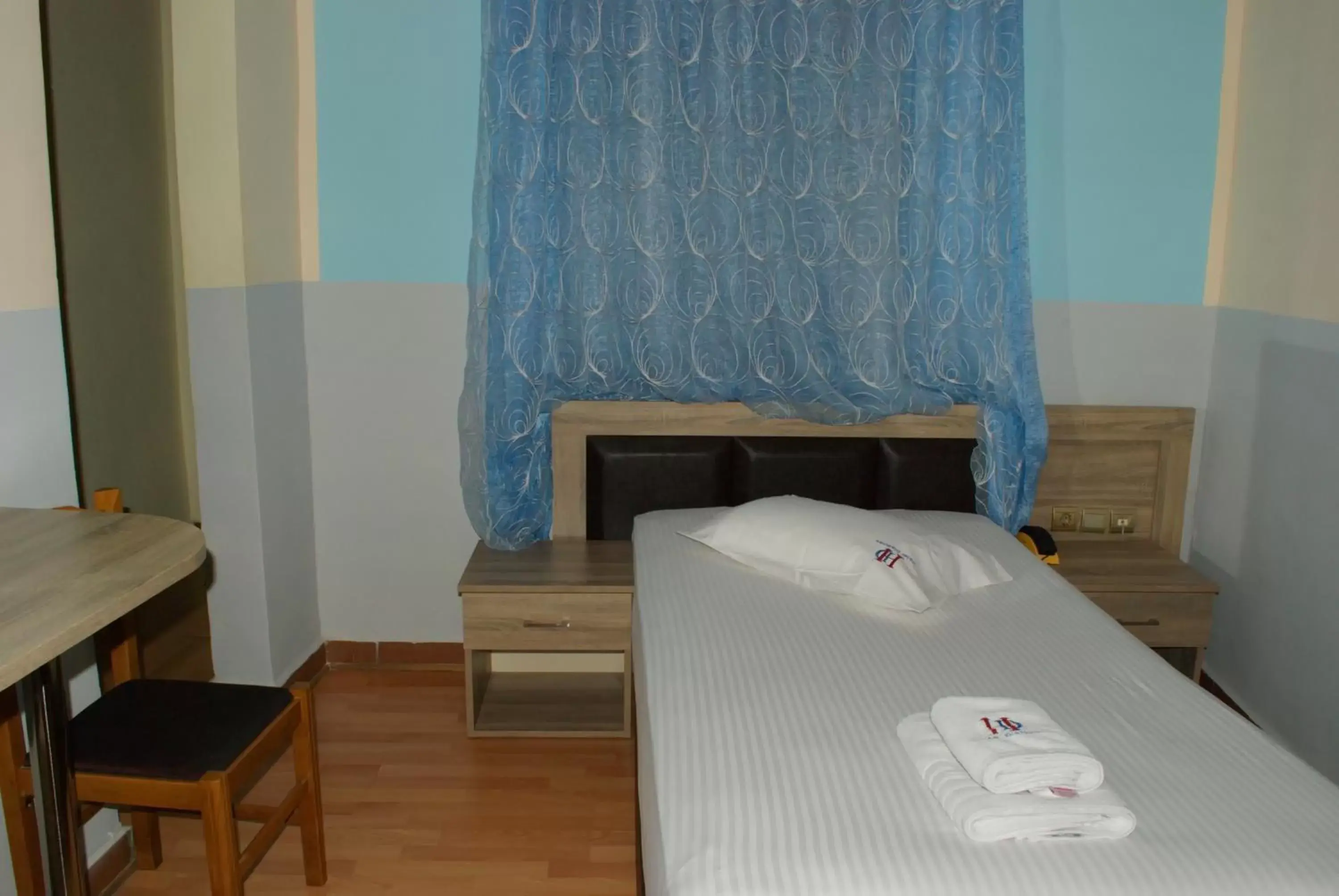 Bed in Diethnes Hotel Bed in Diethnes Hotel