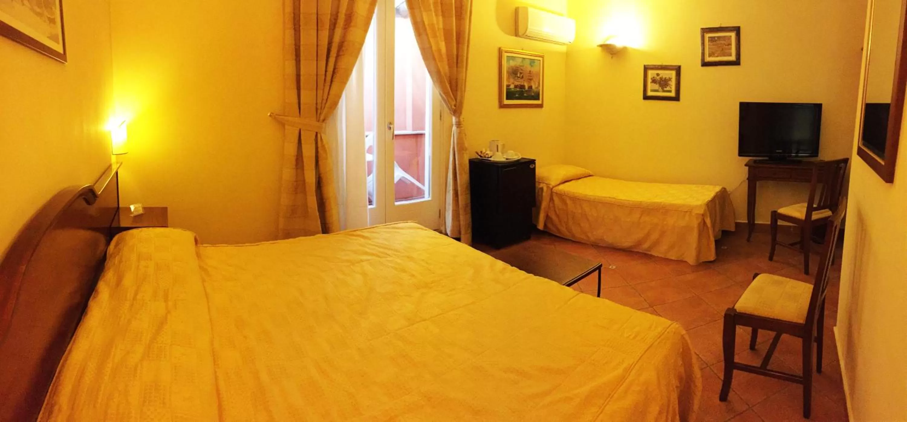 Bed in Hotel Mediterraneo