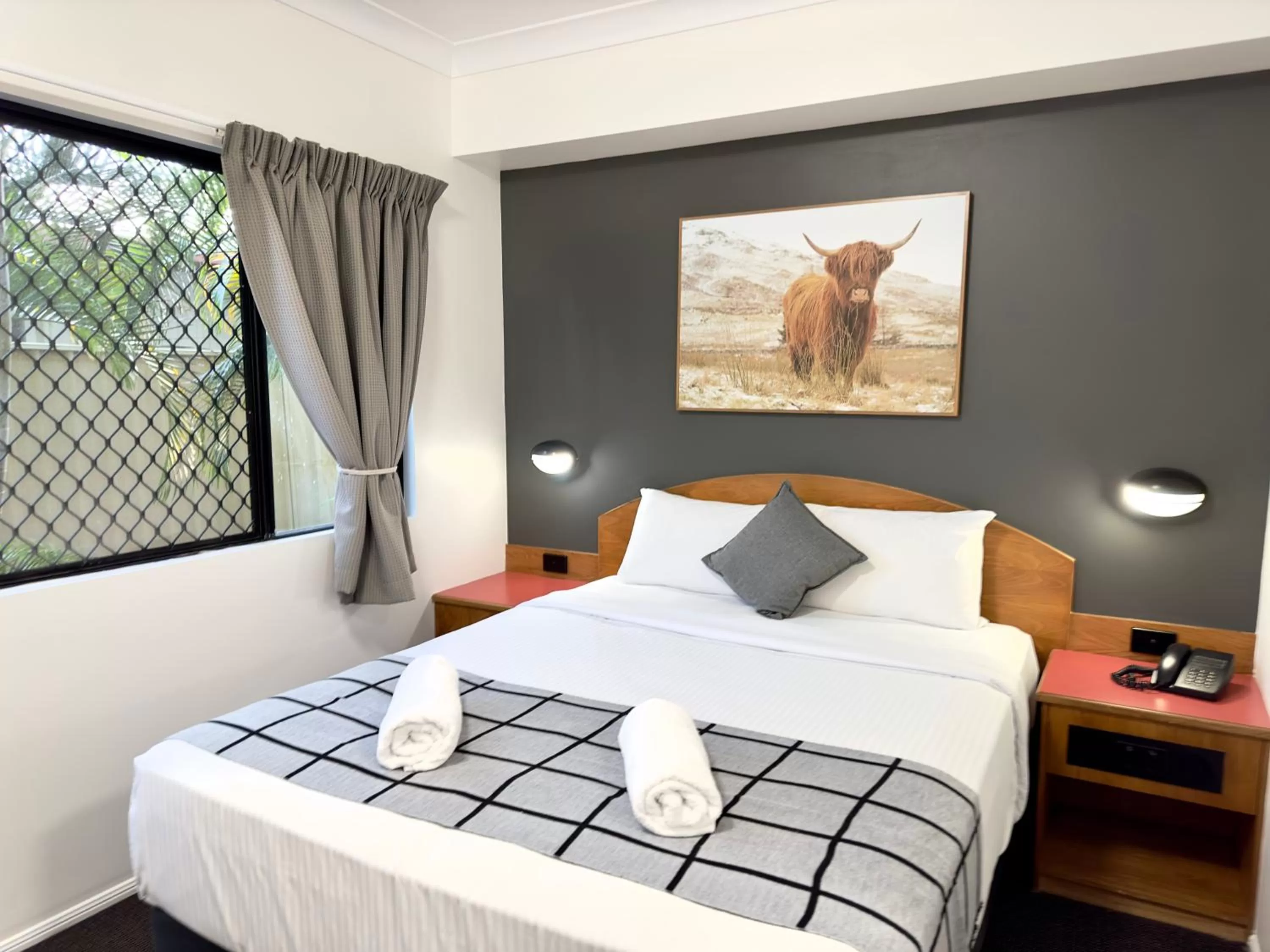 Bed in Mackay Resort Motel