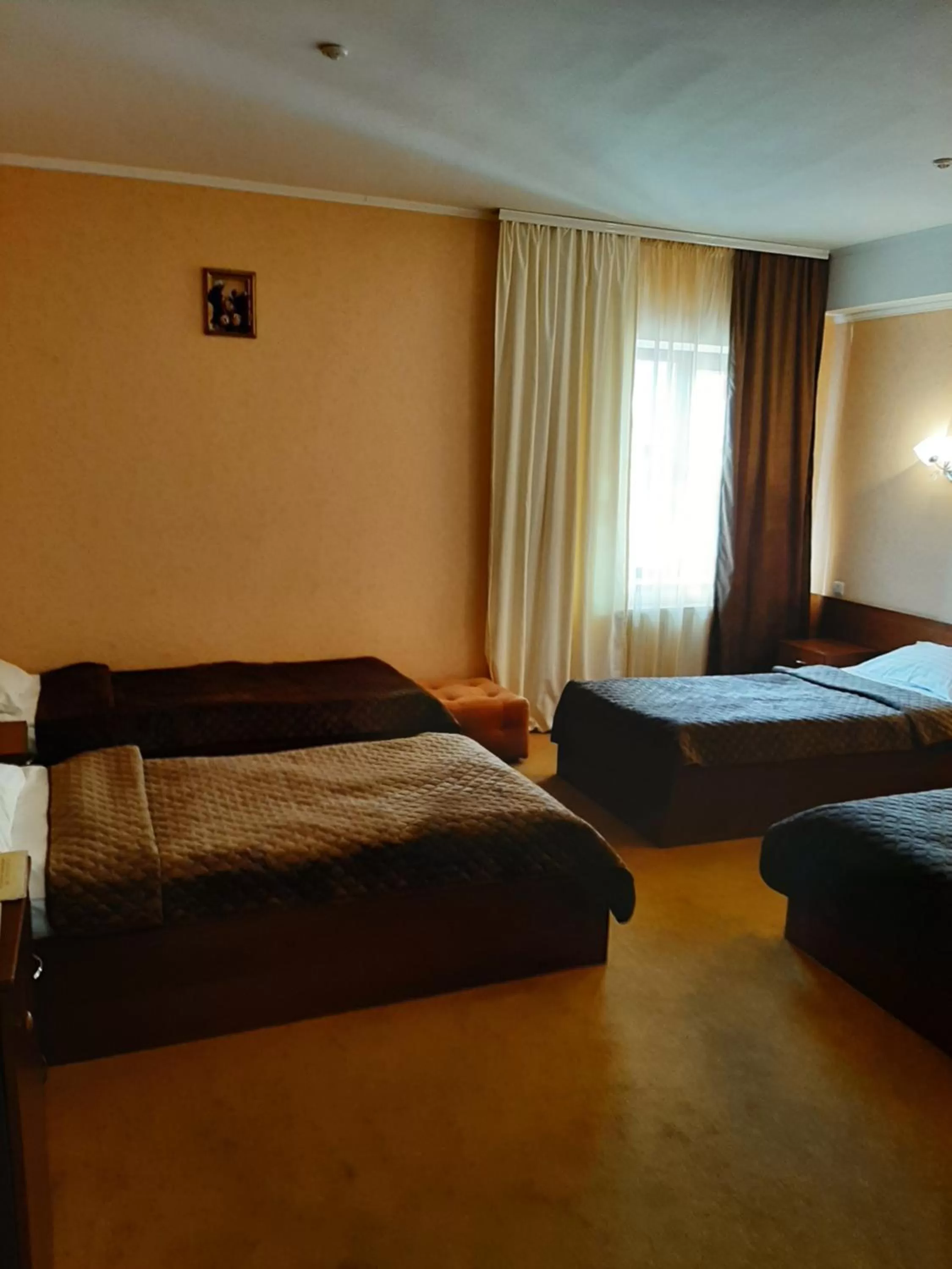 Bed in Stara Vezha Hotel