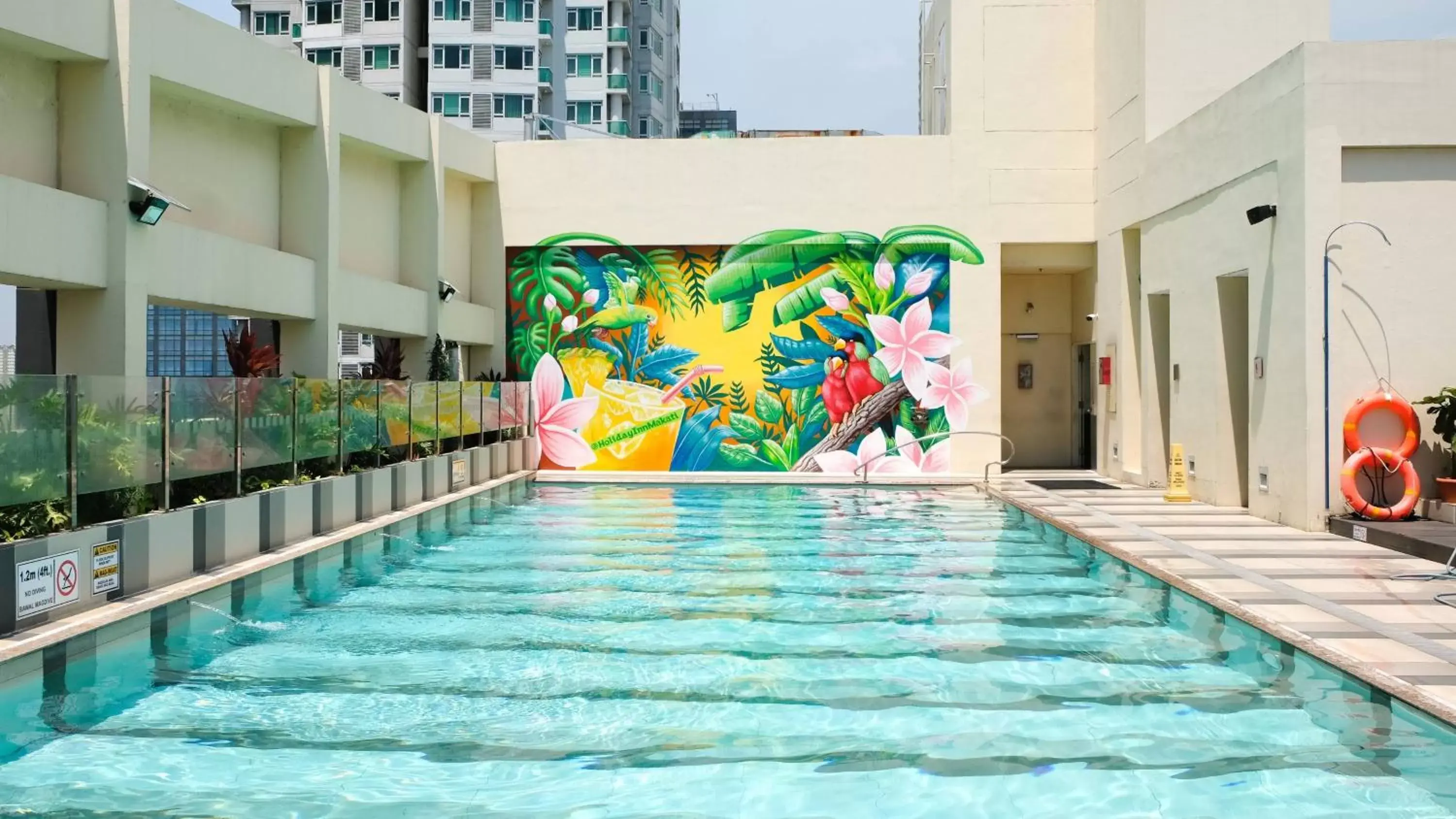 Swimming pool in Holiday Inn & Suites Makati, an IHG Hotel