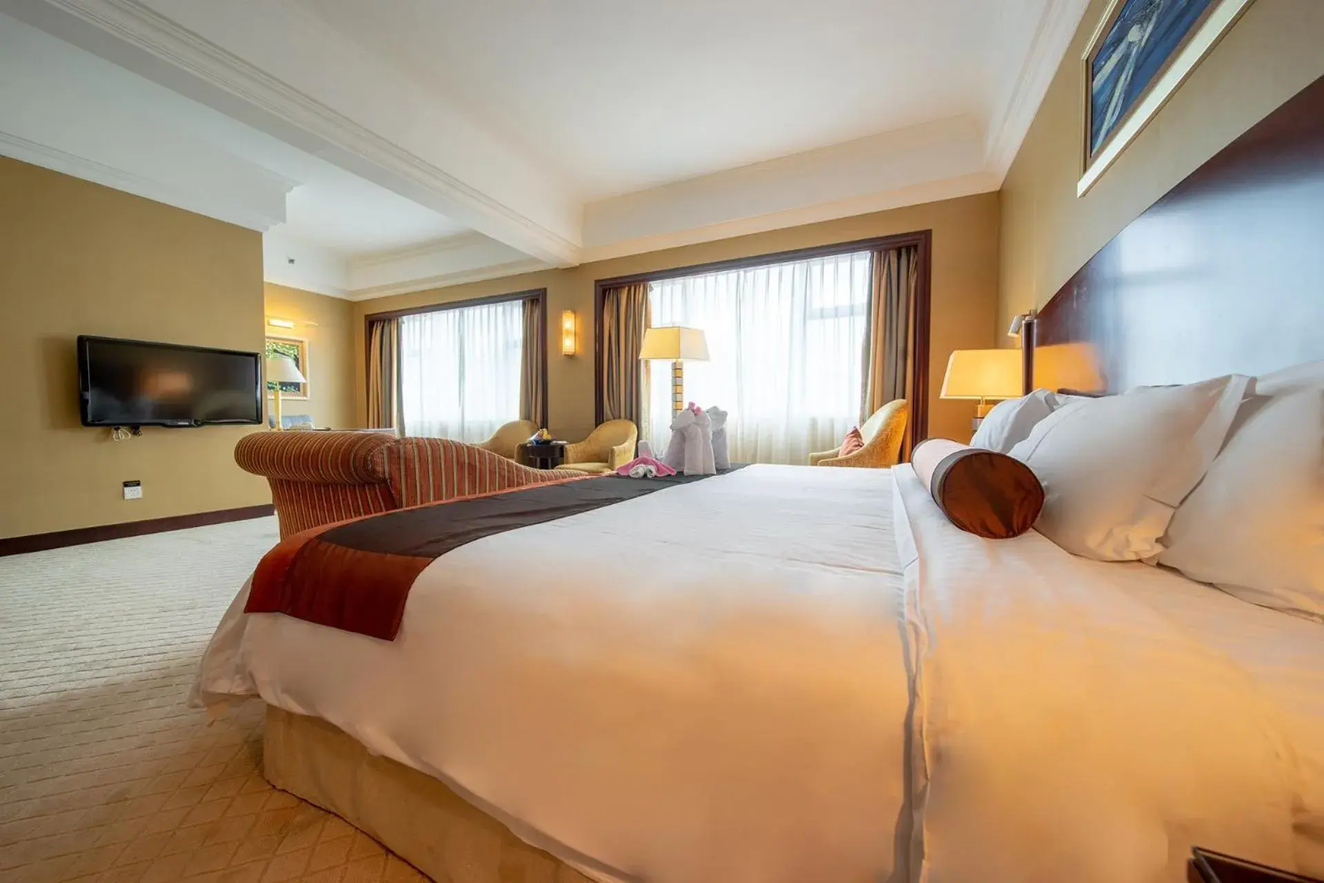 Bed in Grand International Hotel