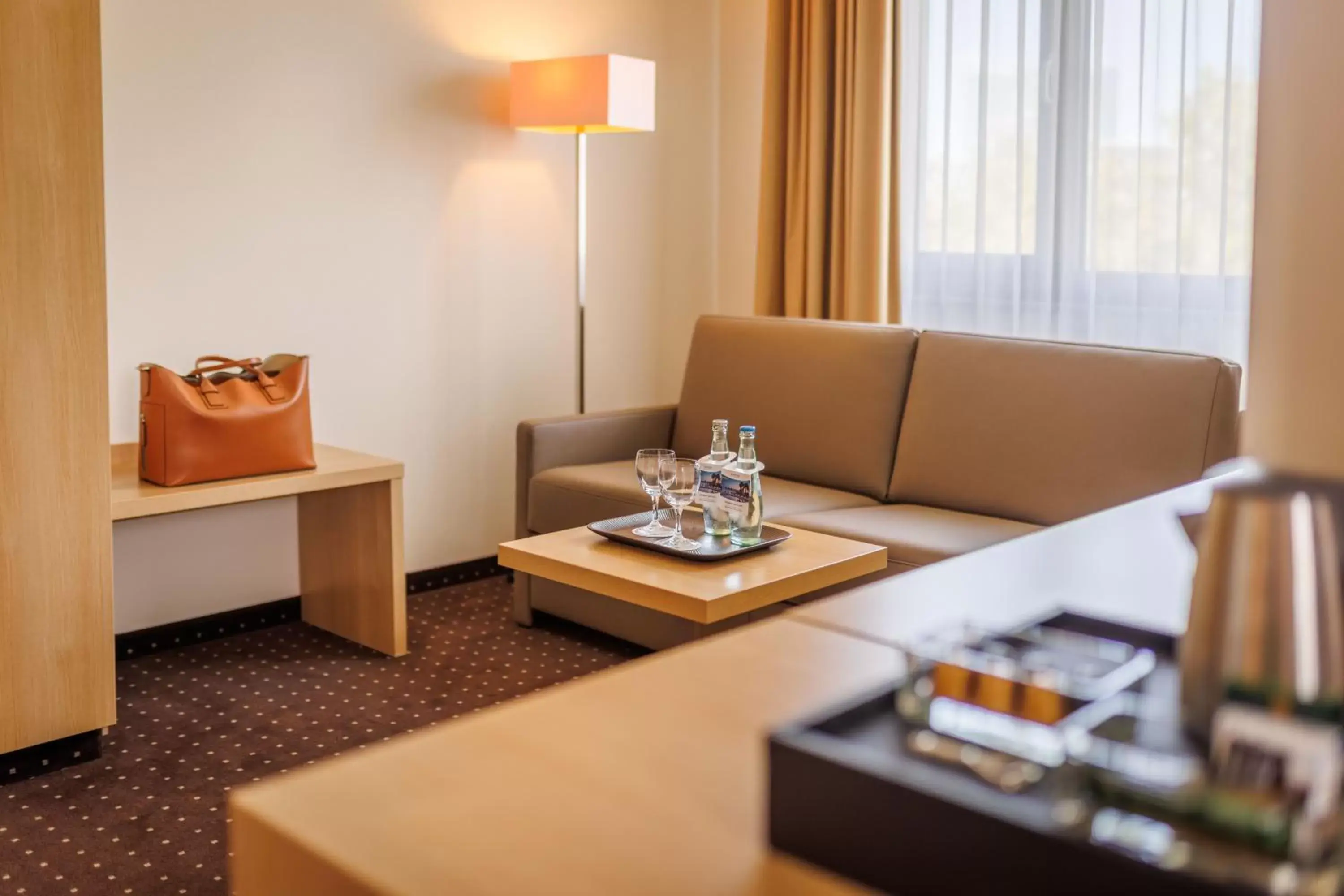 Living room, Seating Area in Lanzcarré Hotel Mannheim, a member of Radisson Individuals