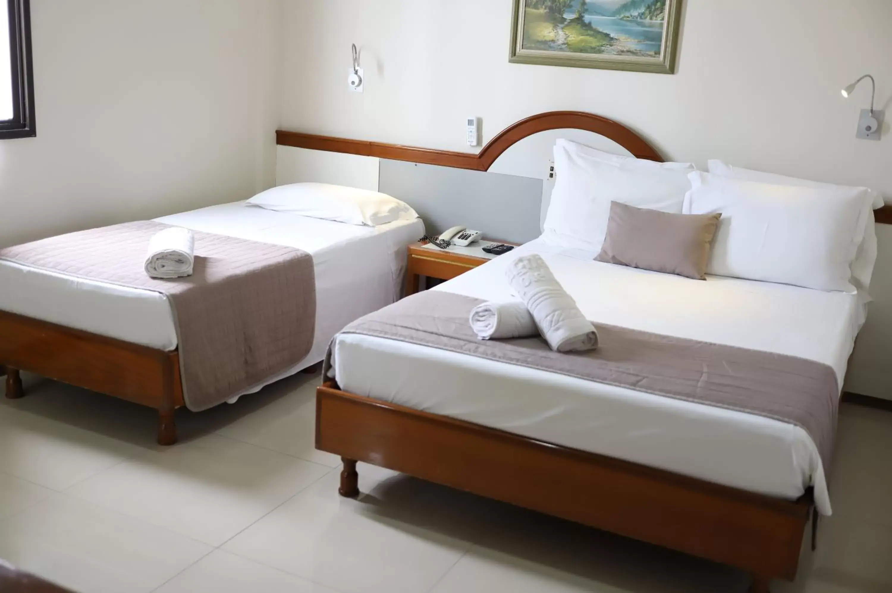 Photo of the whole room, Bed in Champagnat Praia Hotel